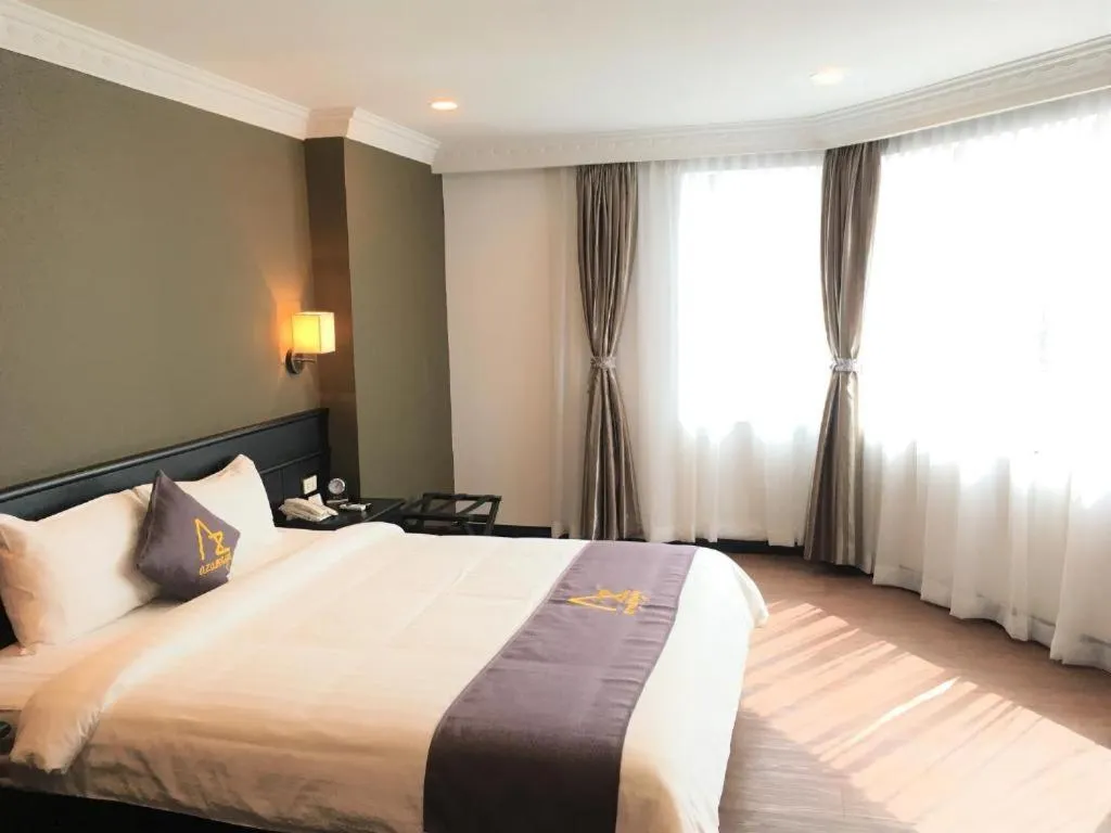 Bed in Azumaya Hotel Phnom Penh