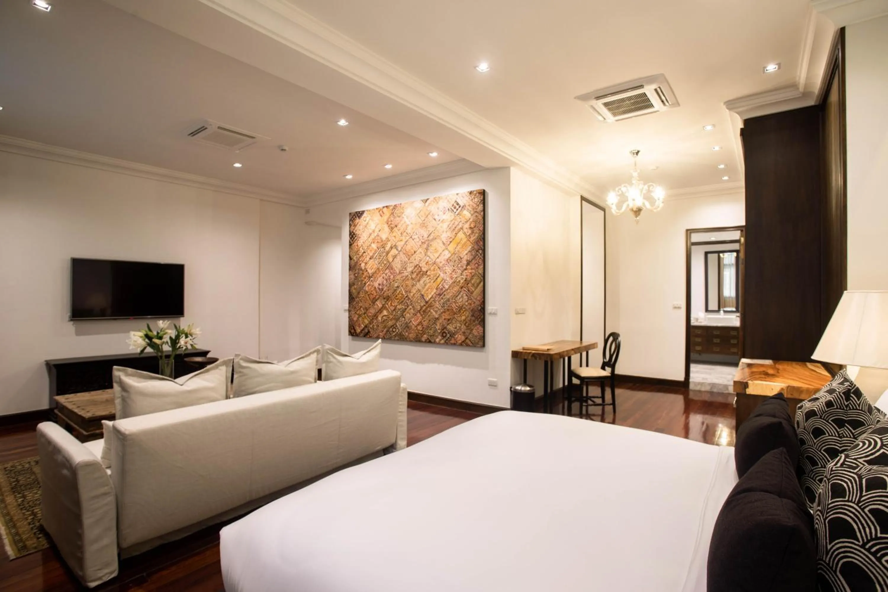 Living room, Bed in The Bridge An Eclectic Luxotel