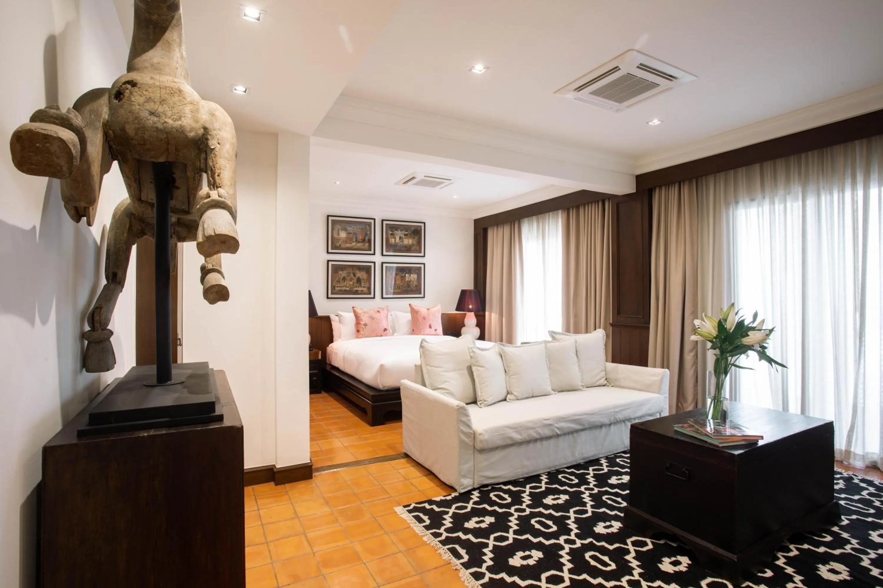 Seating area, Bed in The Bridge An Eclectic Luxotel