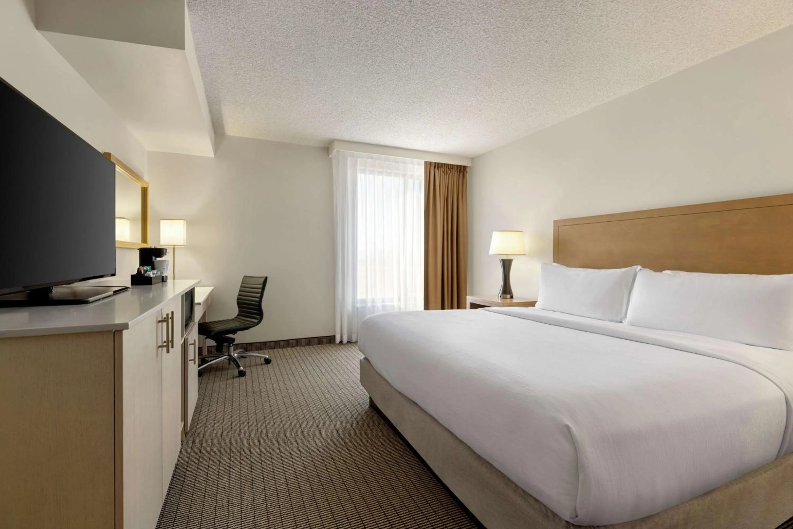 Bed in Embassy Suites by Hilton Denver International Airport