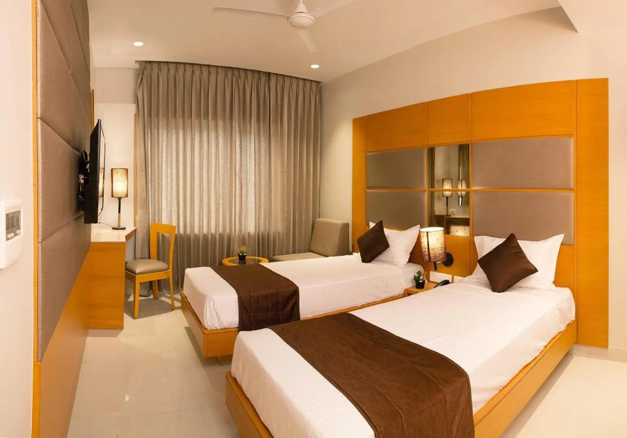 Bedroom, Bed in Sri Aadhish Grand Hotel