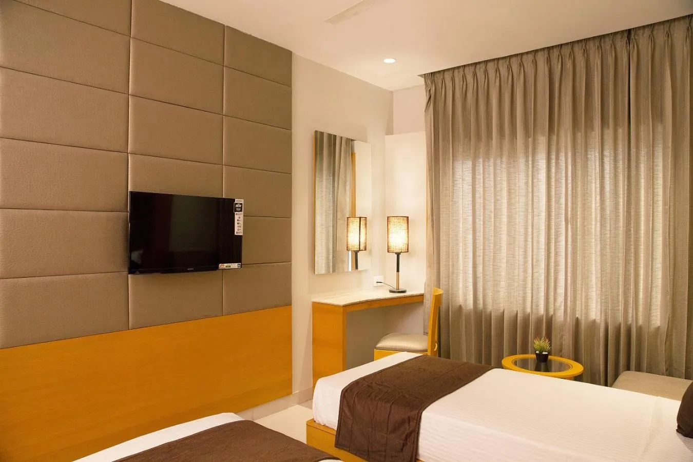 TV and multimedia, Bed in Sri Aadhish Grand Hotel