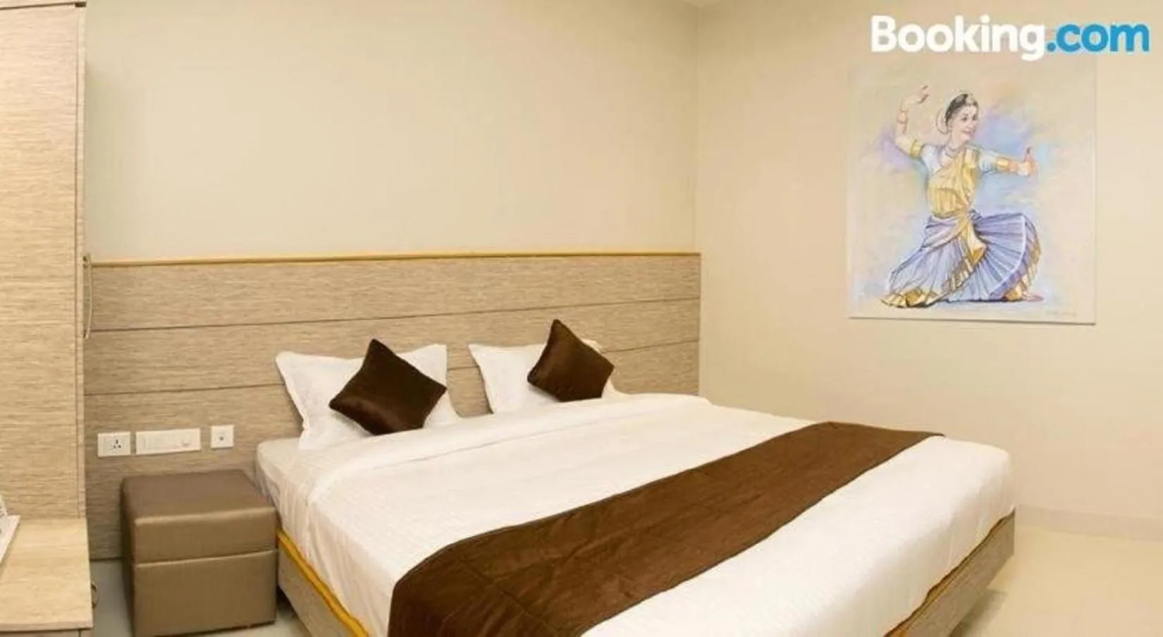 Bed in Sri Aadhish Grand Hotel