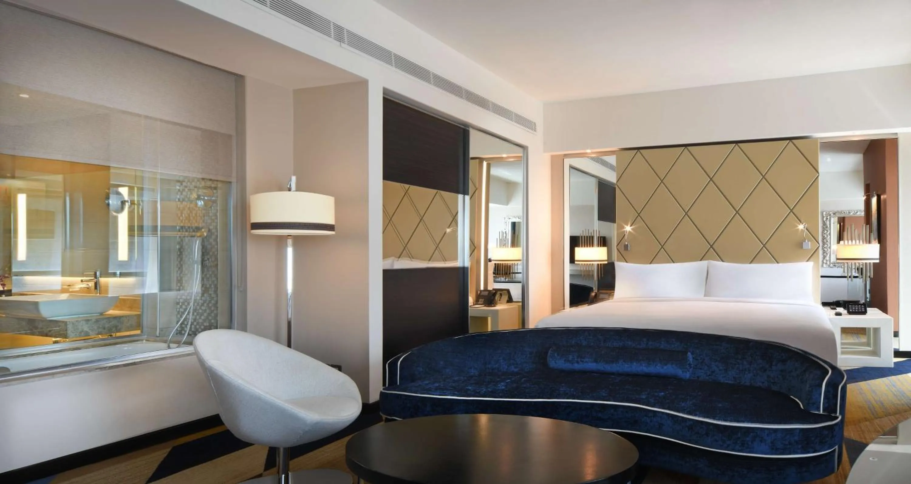 Bathroom, Bed in Hilton Amman