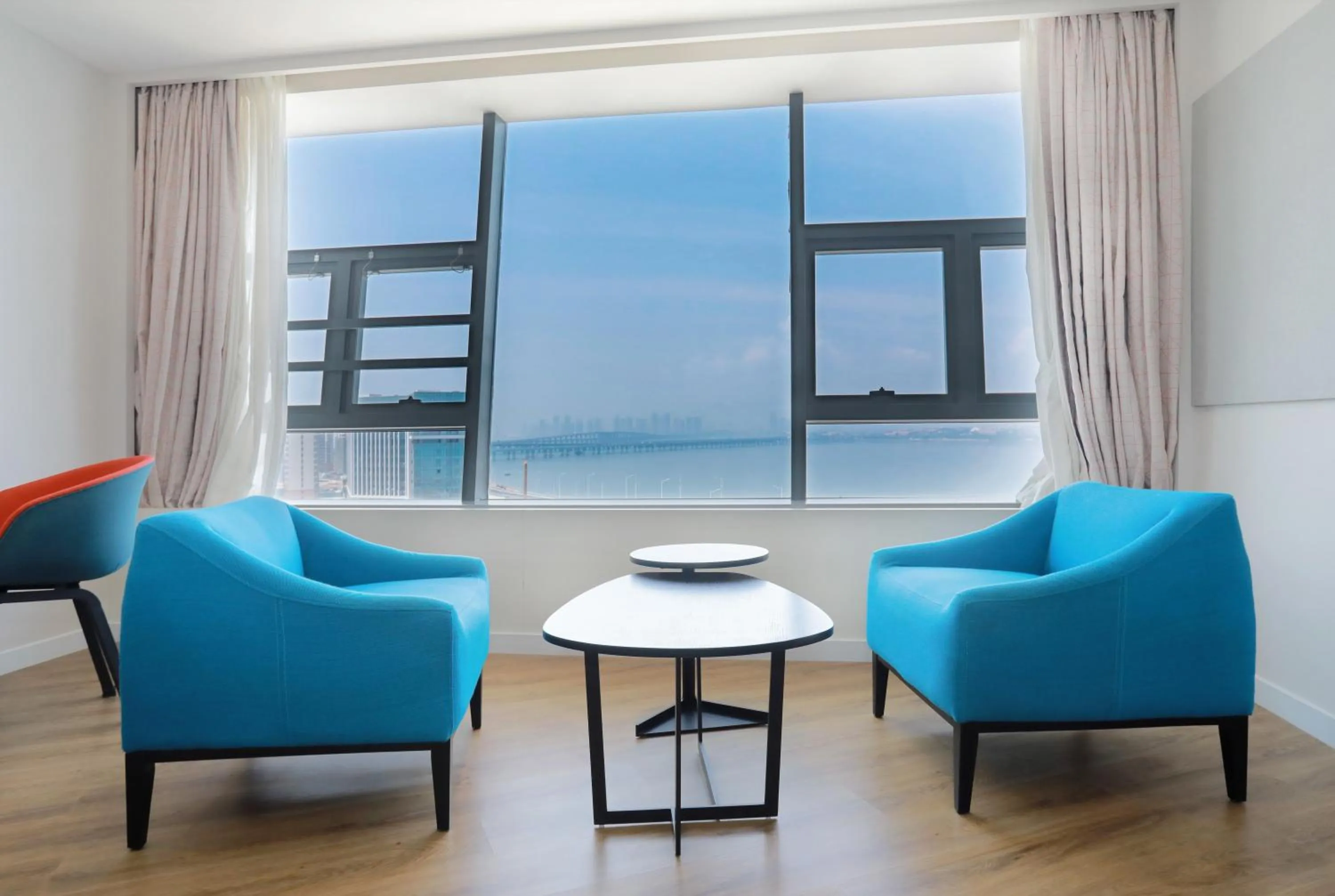 Seating area in Holiday Inn Express Xiamen Airport Zone by IHG