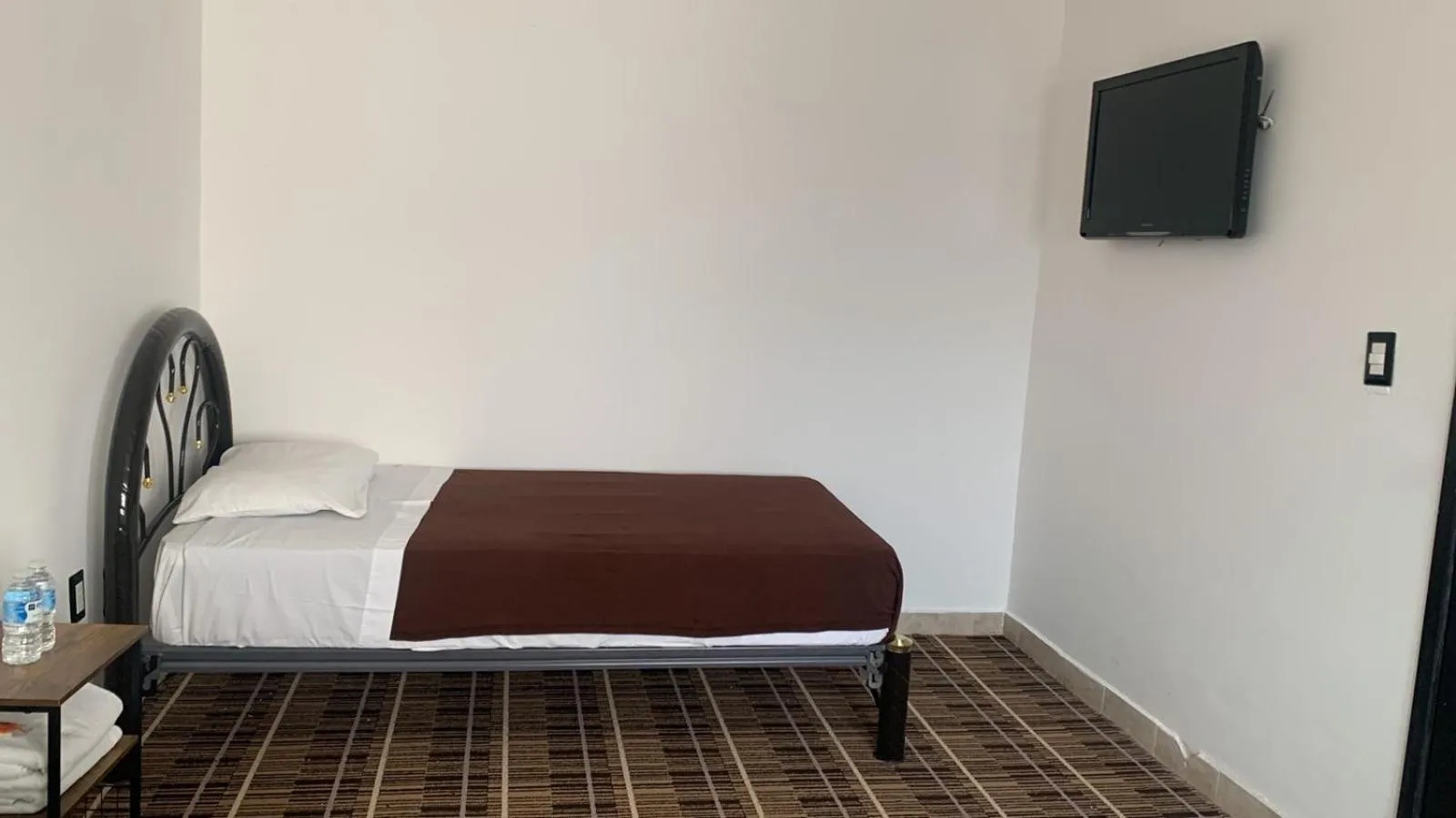 Bed in Kuku Ruku Hotel