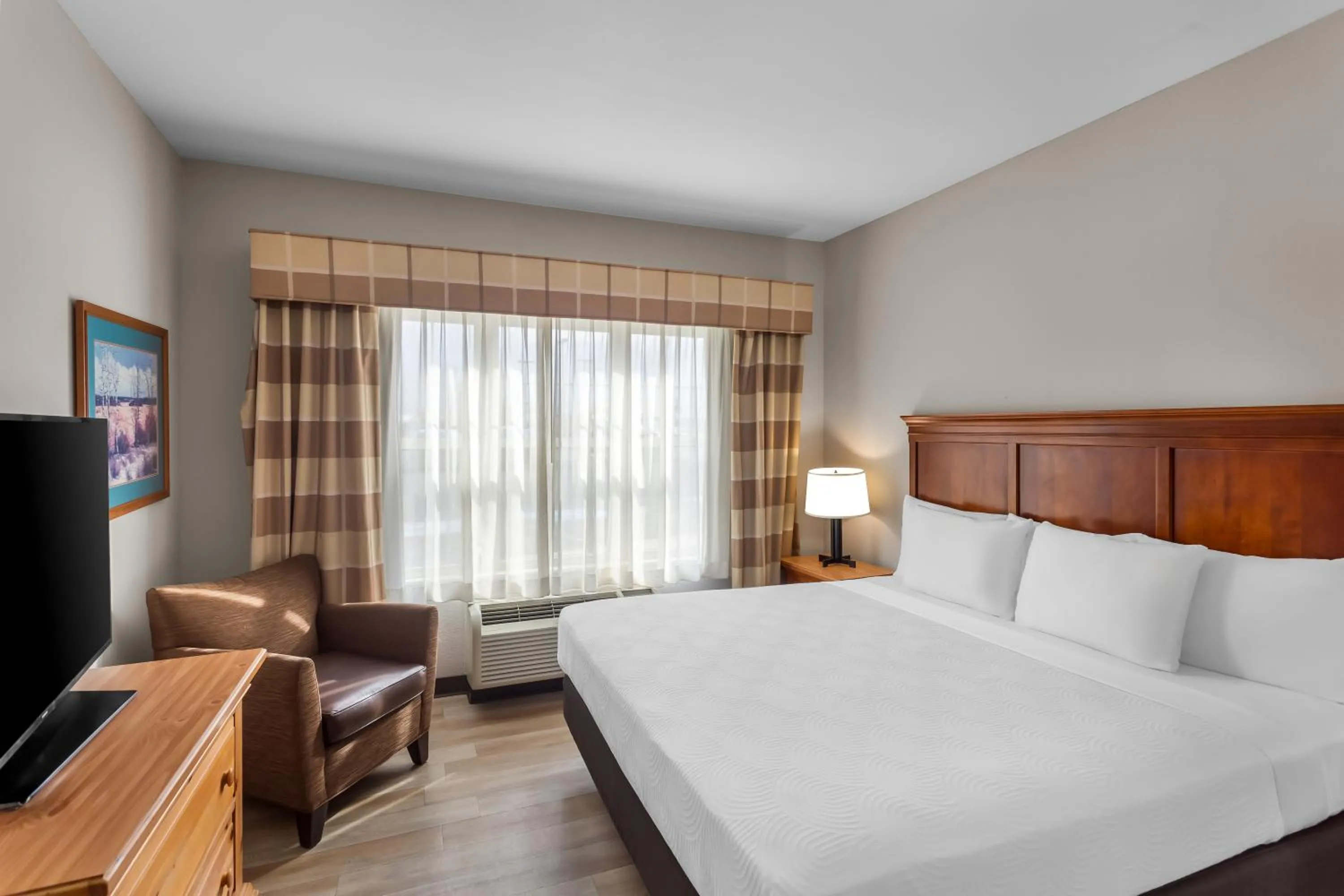 Guests, Bed in Country Inn & Suites by Radisson, Beckley, WV