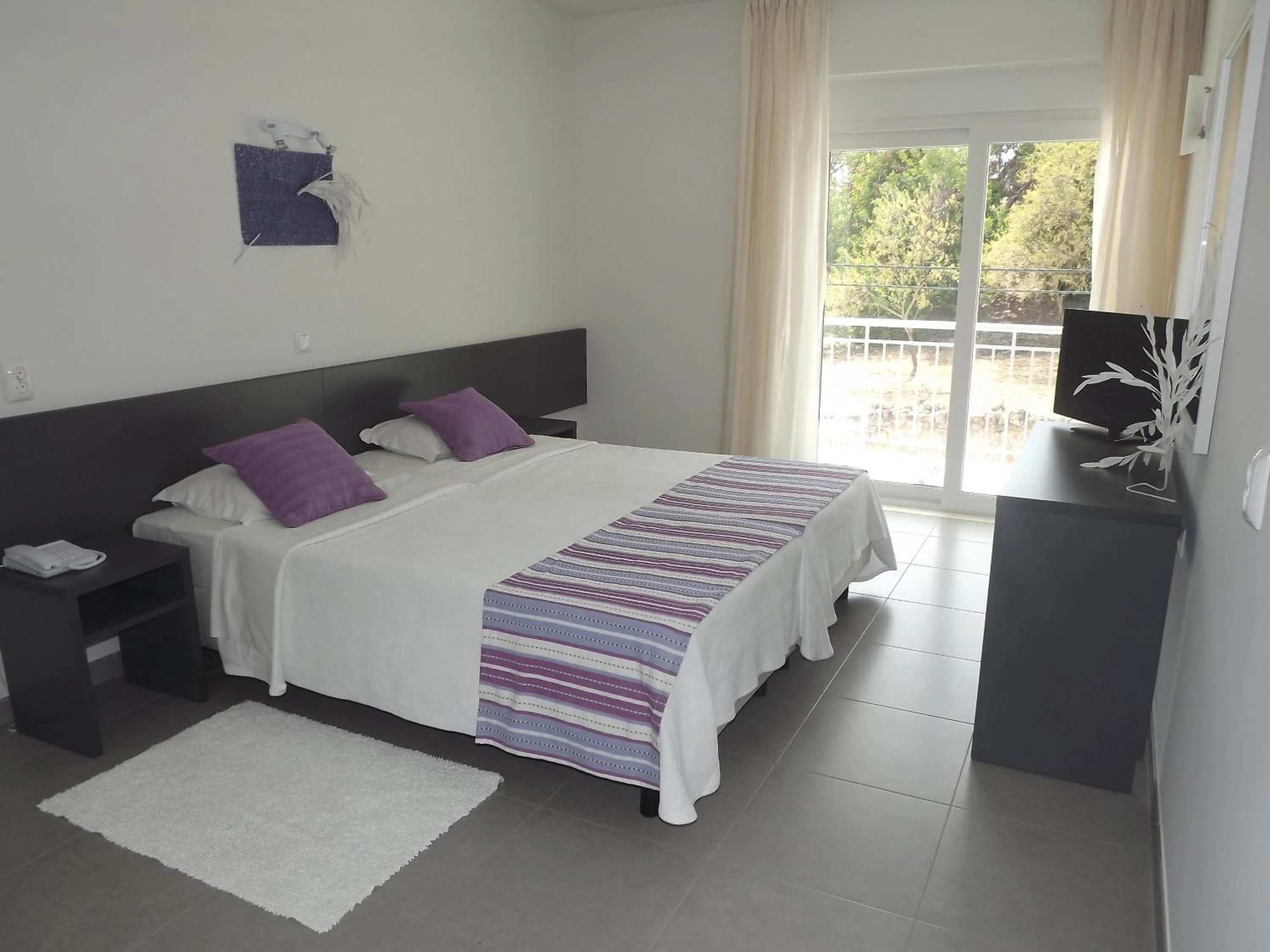 Bed in Boutique & Villas Boliqueime