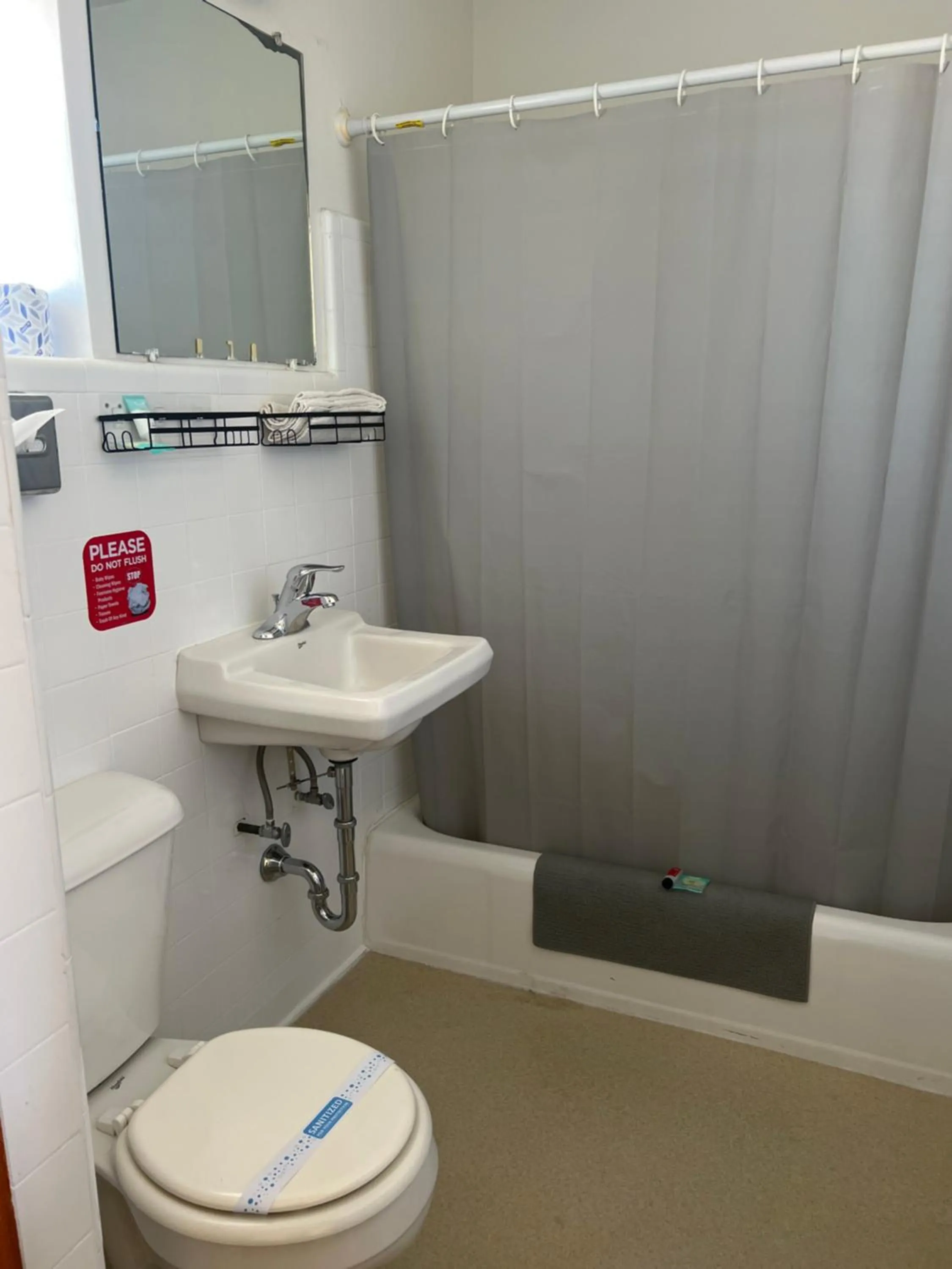 Bathroom in Mid-town Motel