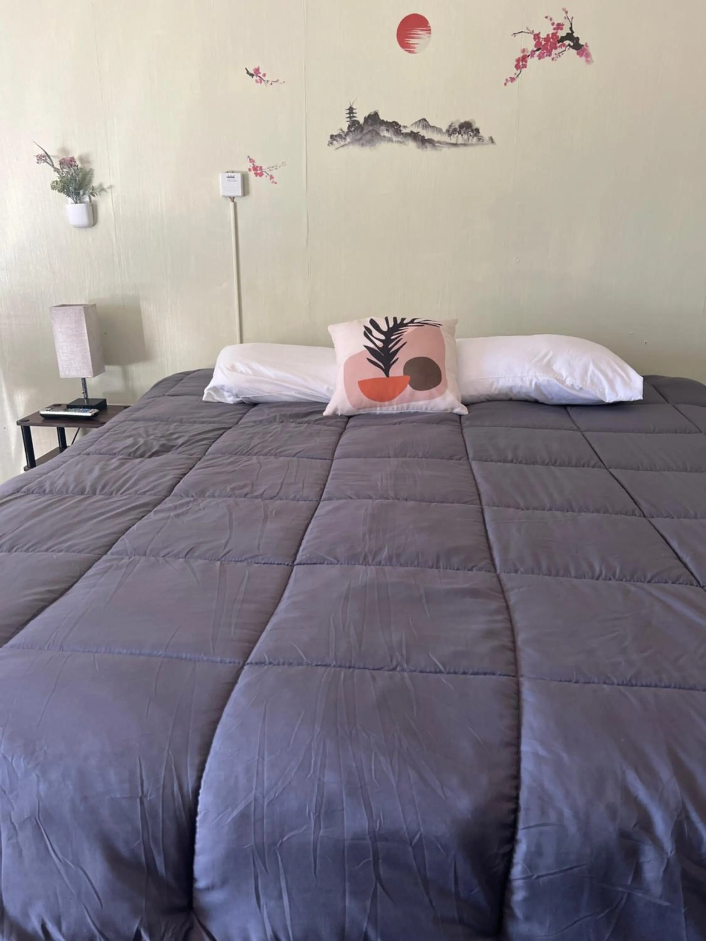 Bed in Mid-town Motel