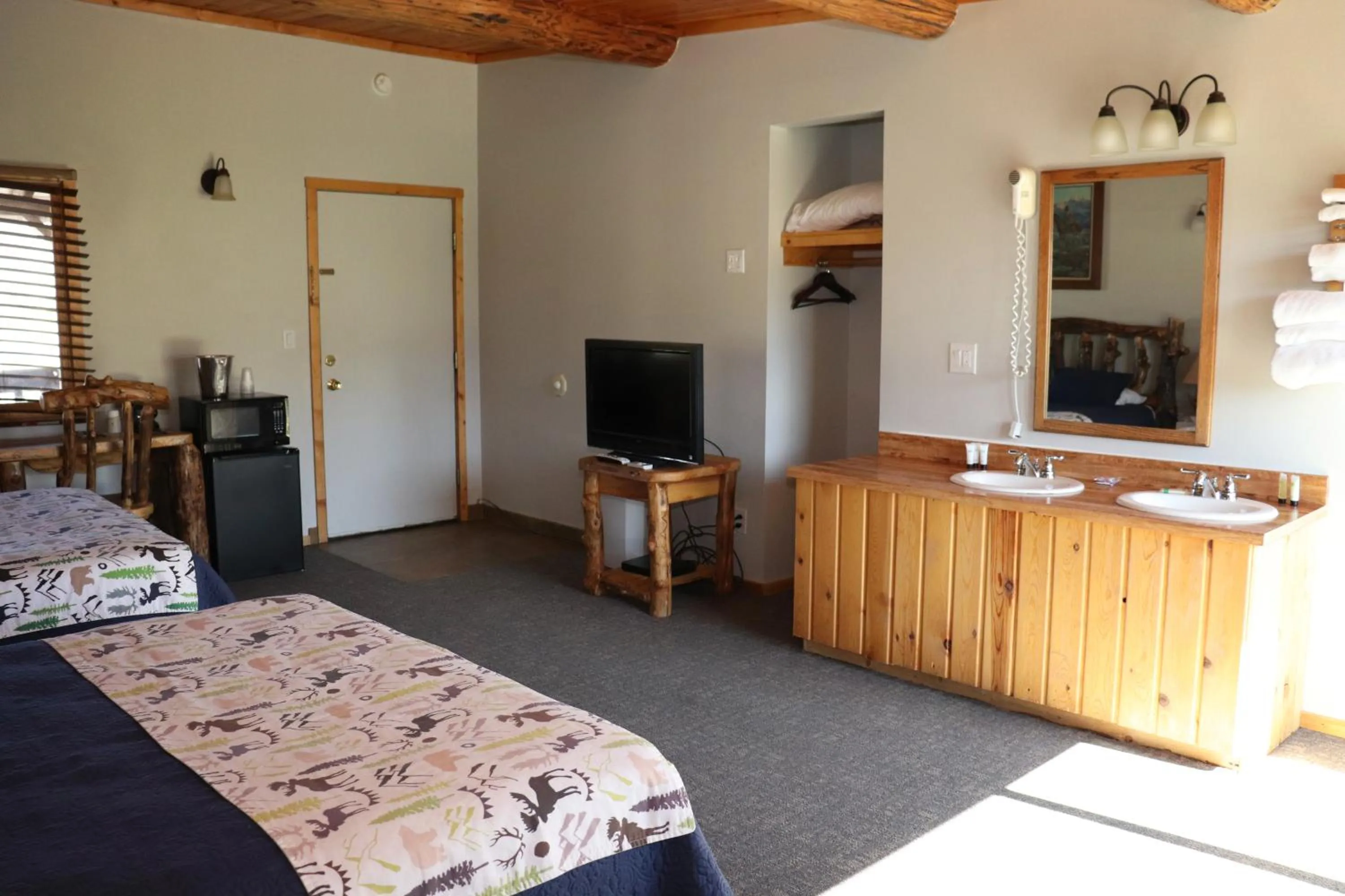 Bed in Yellowstone Valley Inn