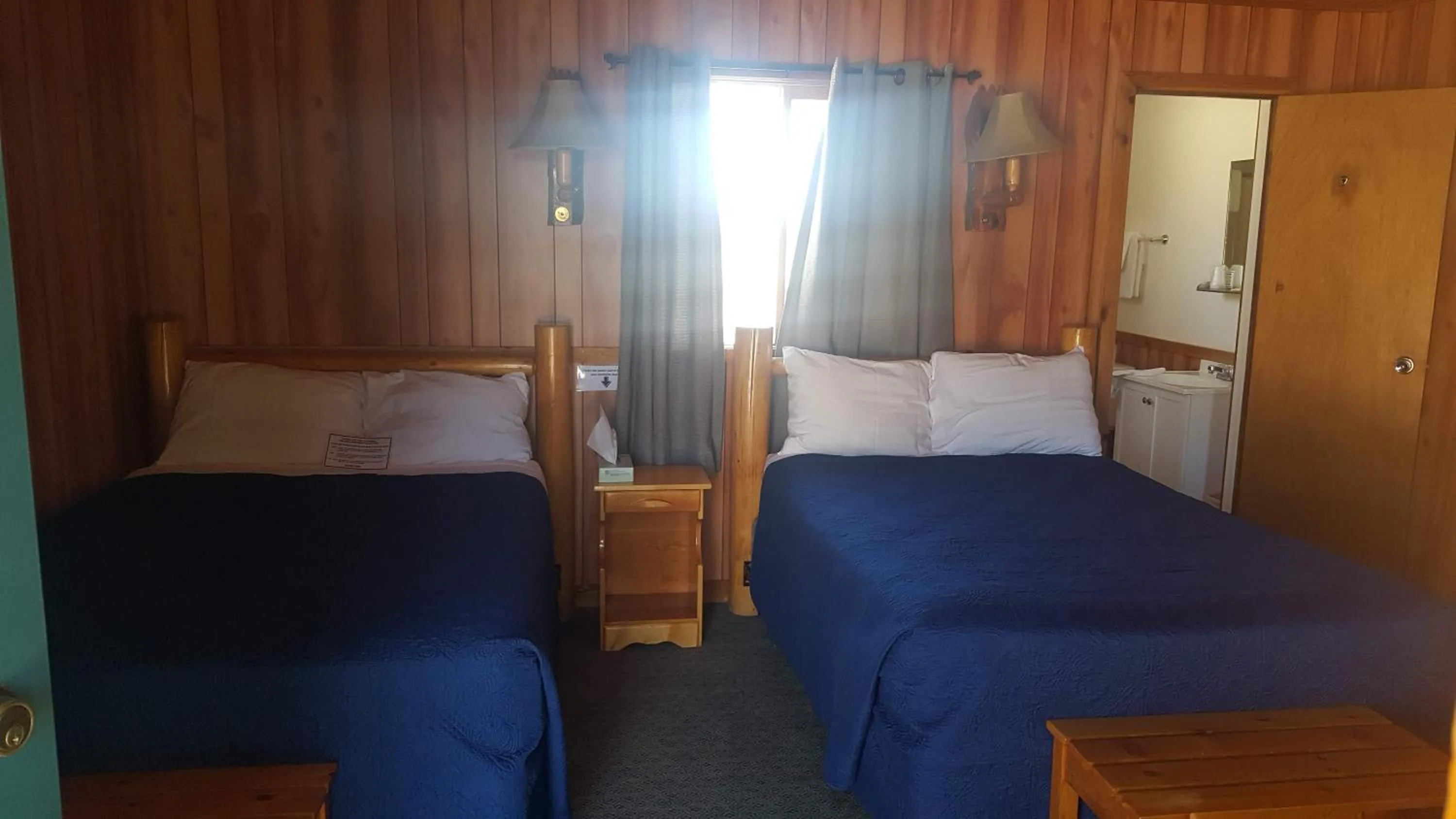 Bed in Yellowstone Valley Inn