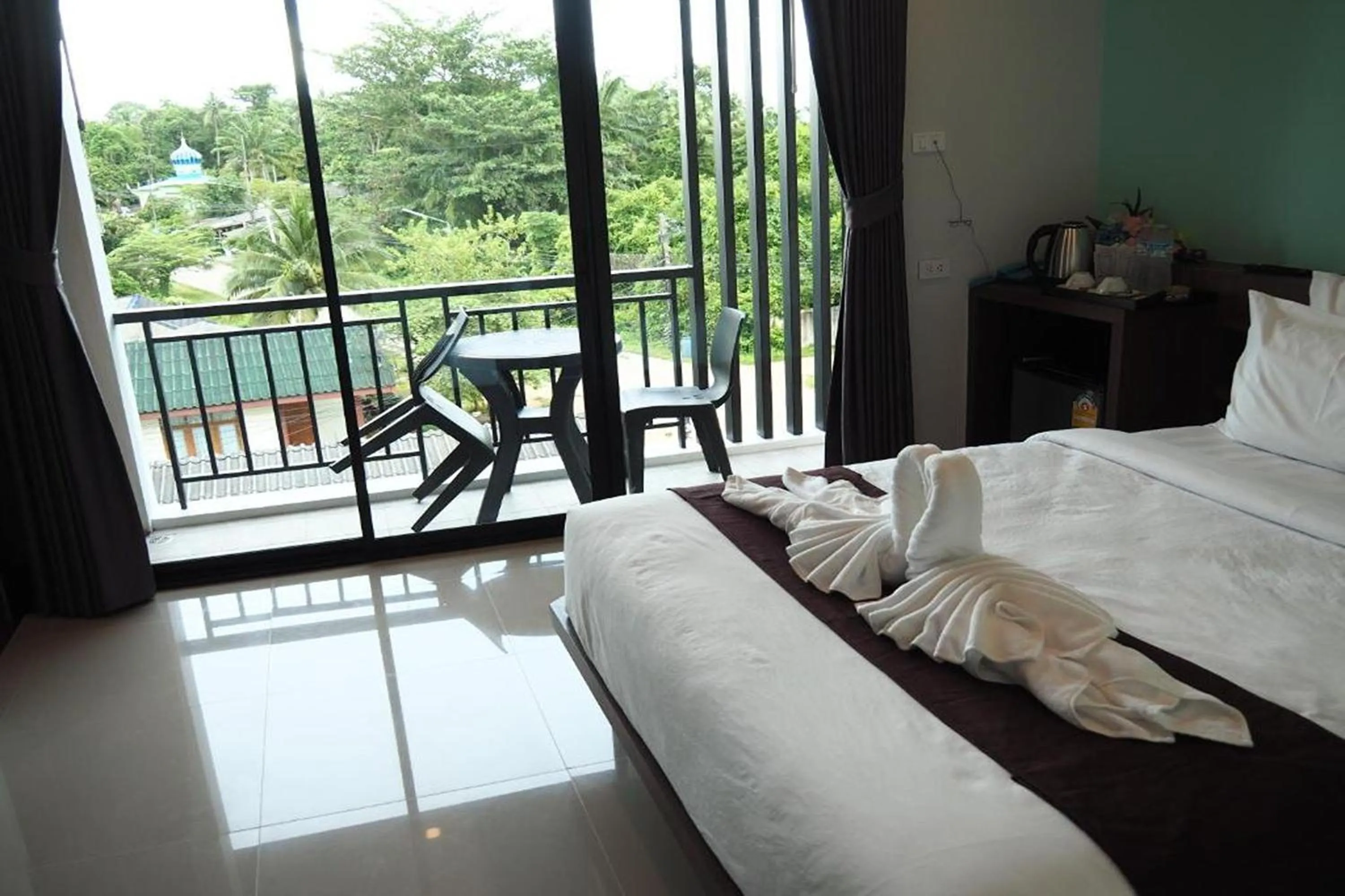 Photo of the whole room, Bed in Friendly Hotel Krabi