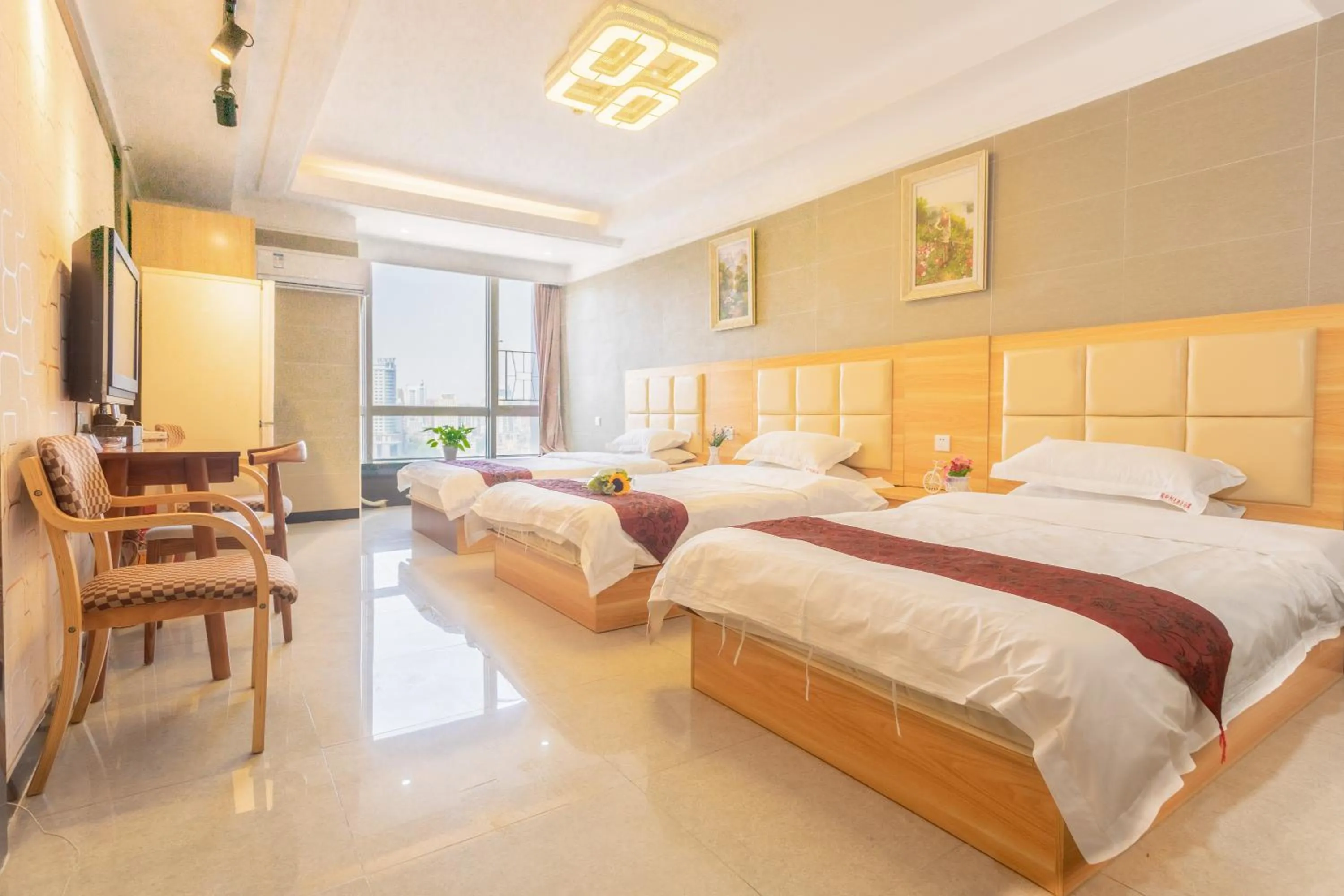 Photo of the whole room, Bed in Sunny International Apartment From Beijing Road