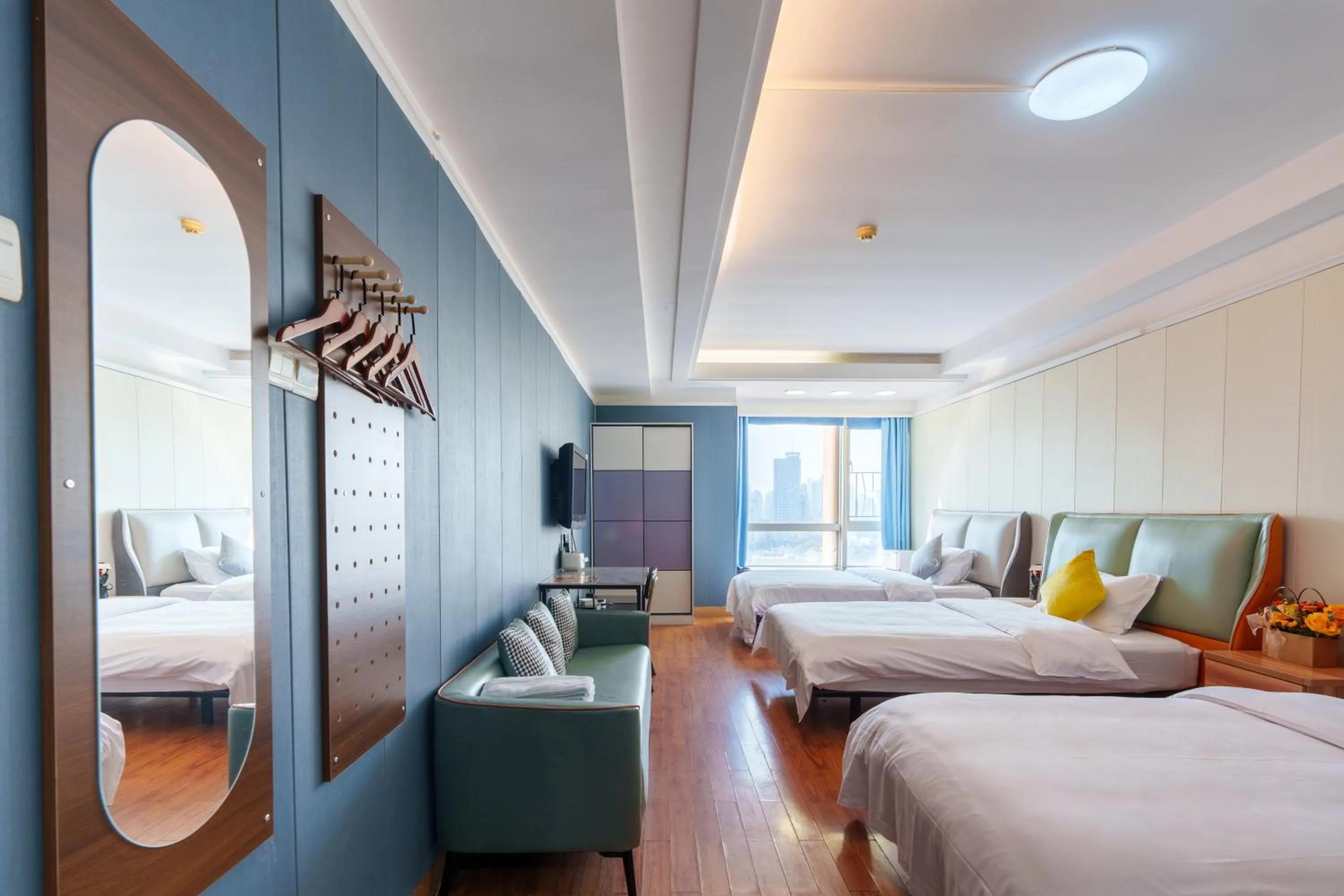 Bed in Sunny International Apartment From Beijing Road