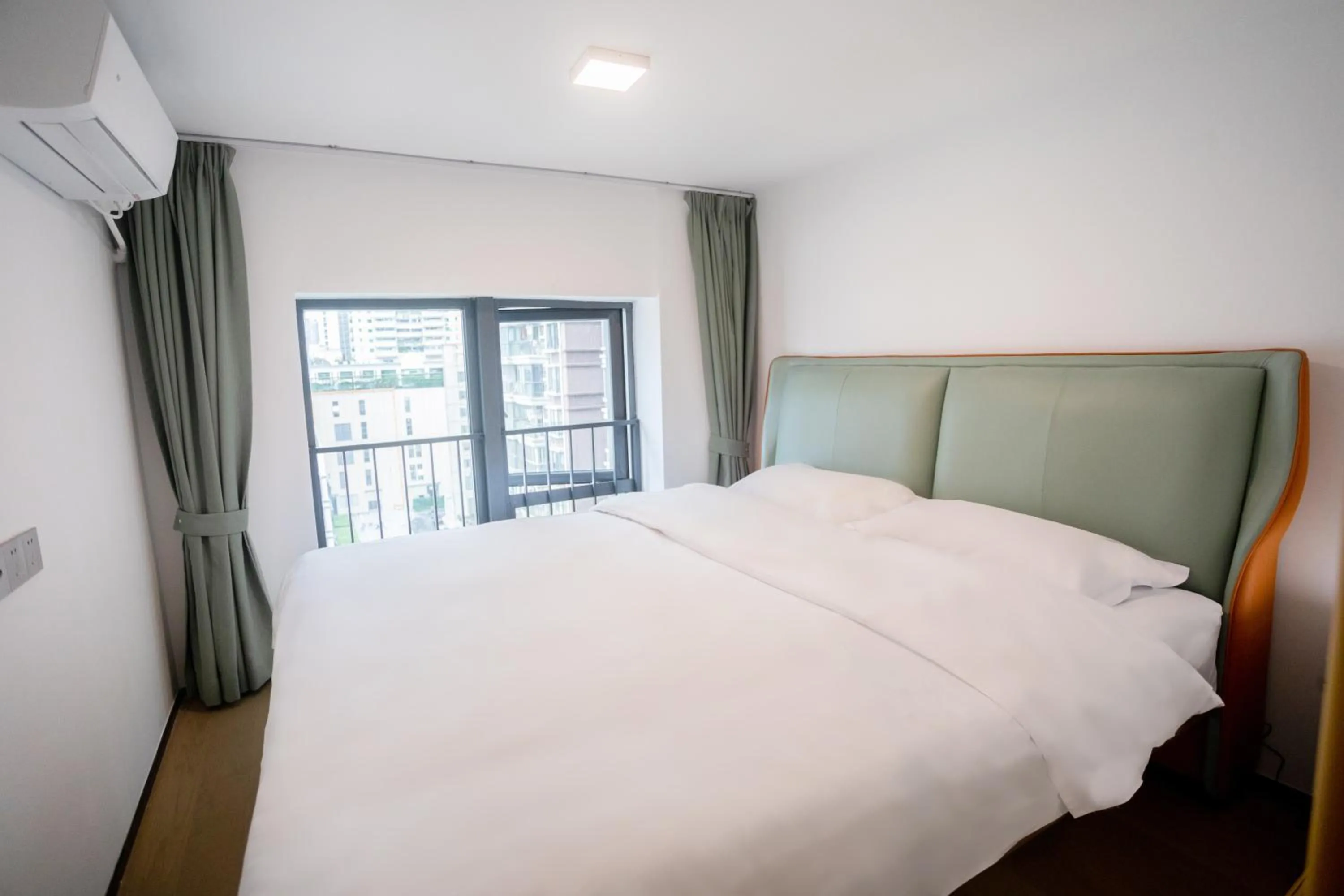 Bedroom, Bed in Sunny International Apartment From Beijing Road