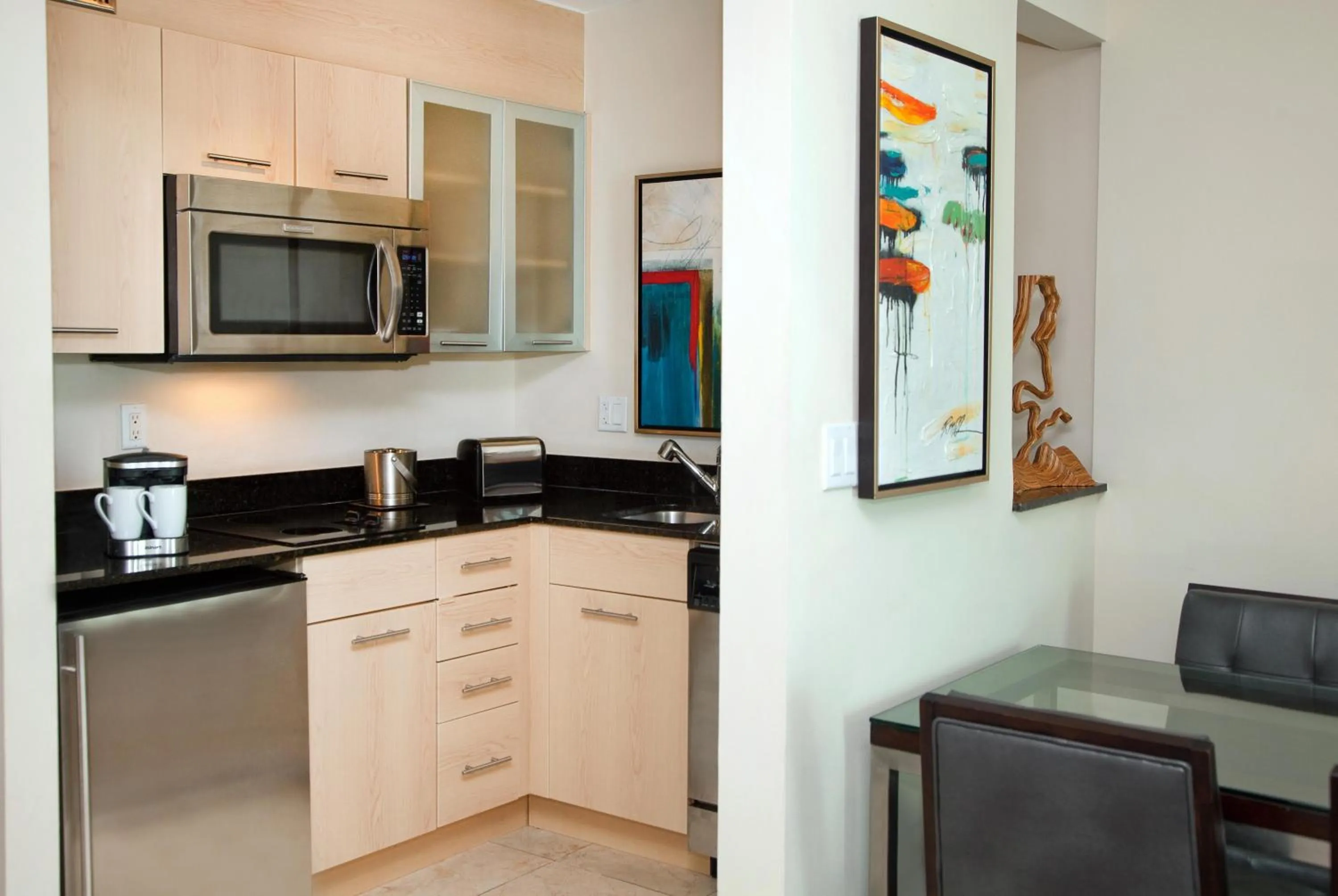 Kitchen or kitchenette in GALLERY One - A DoubleTree Suites by Hilton Hotel