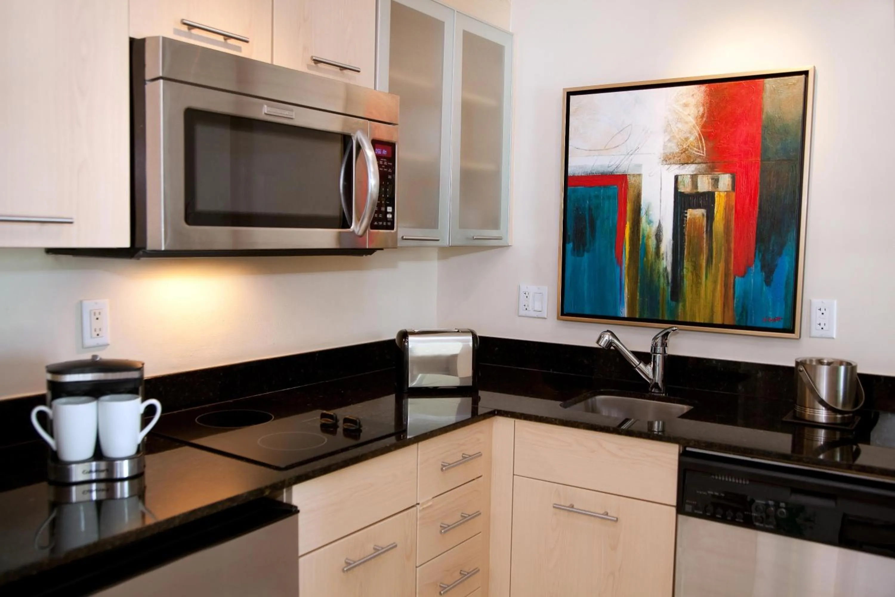 Kitchen or kitchenette in GALLERY One - A DoubleTree Suites by Hilton Hotel