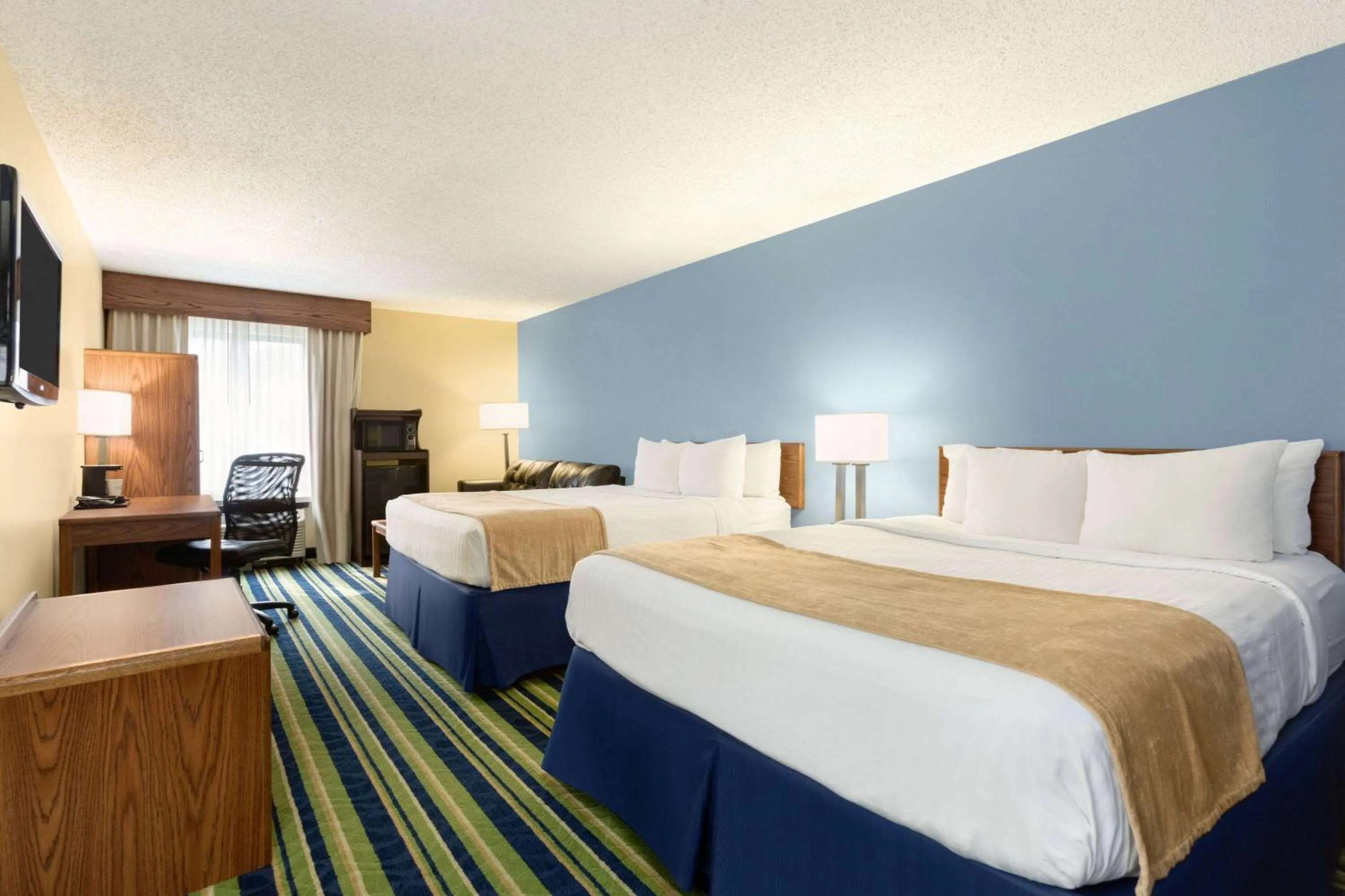 Bed in Days Inn by Wyndham Fargo - West Acres