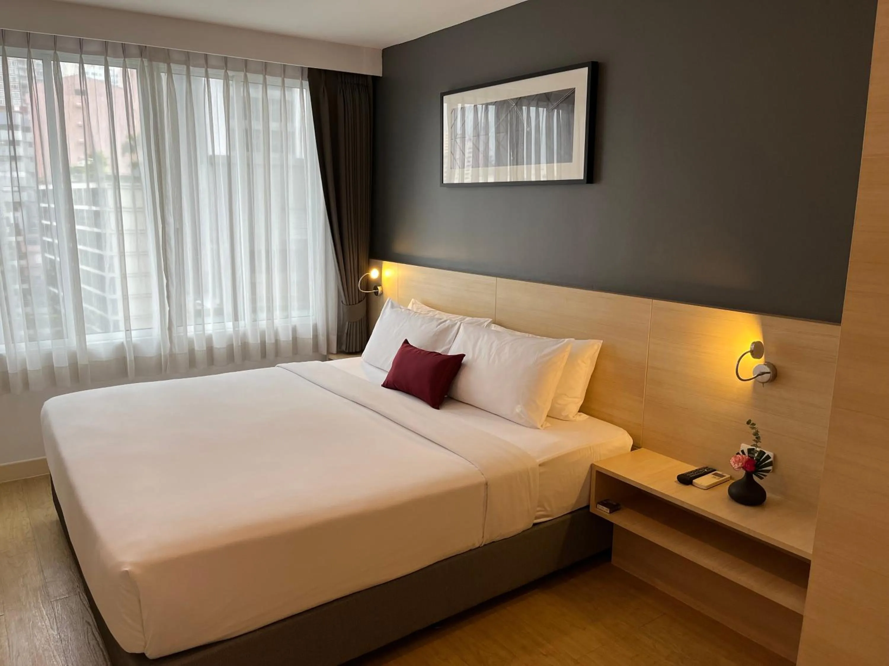 Bed in Arize Hotel Sukhumvit