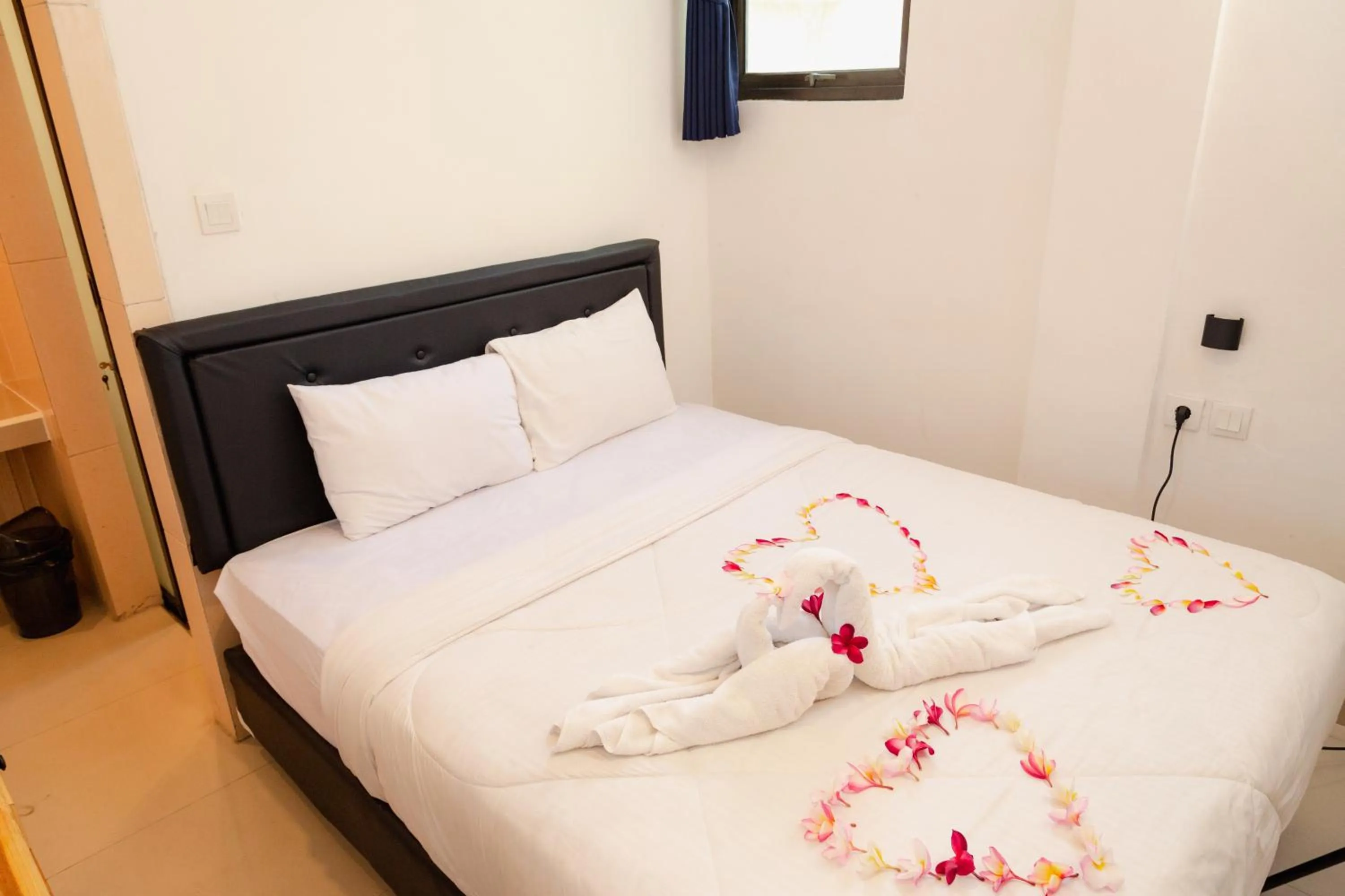 Bed in Suardana Inn's