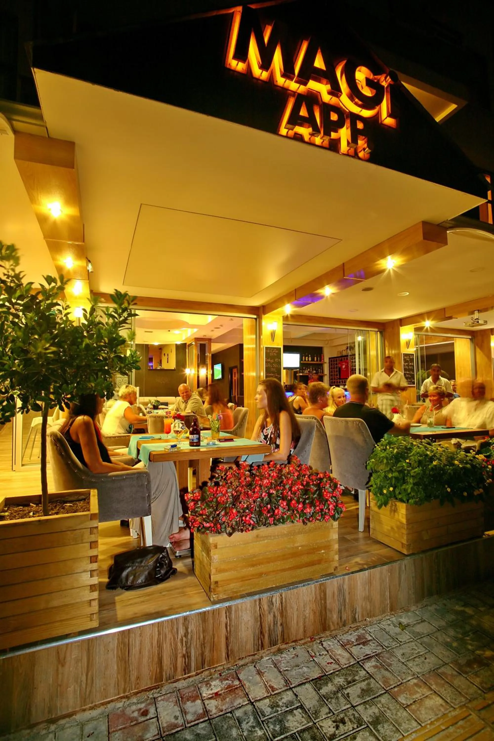 Property logo or sign in Magi Apart Hotel