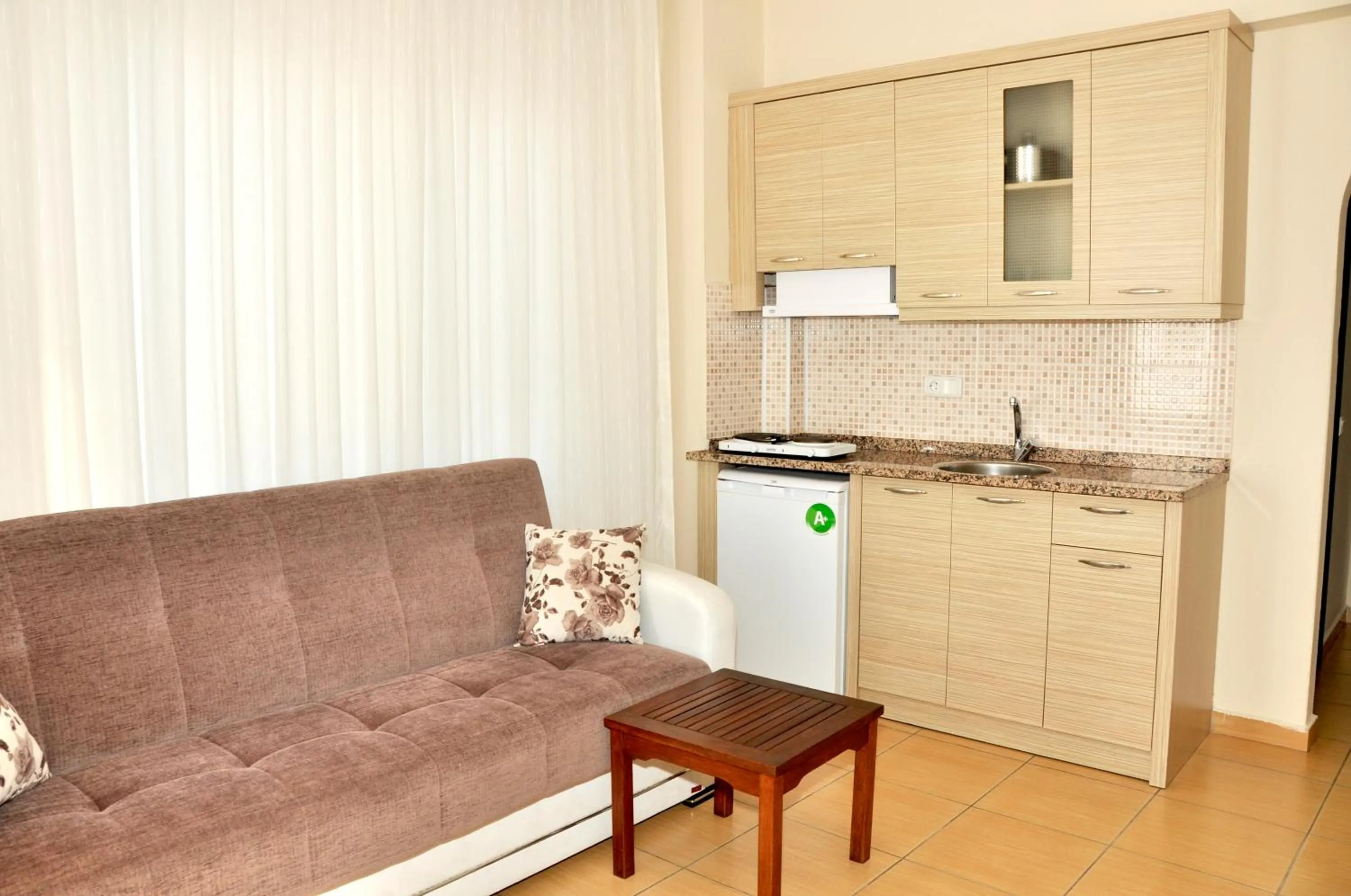 Living room in Magi Apart Hotel