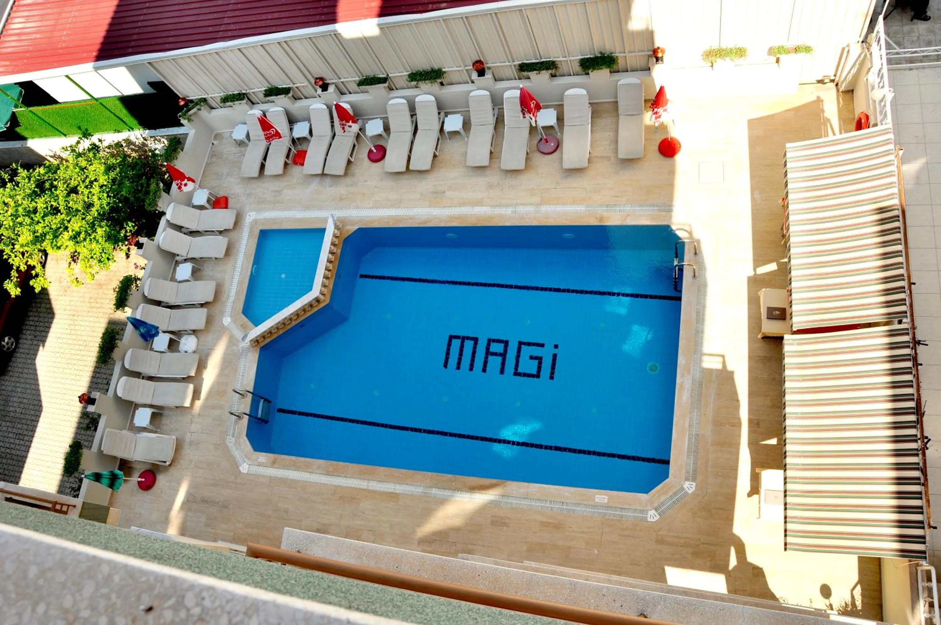 Swimming pool in Magi Apart Hotel