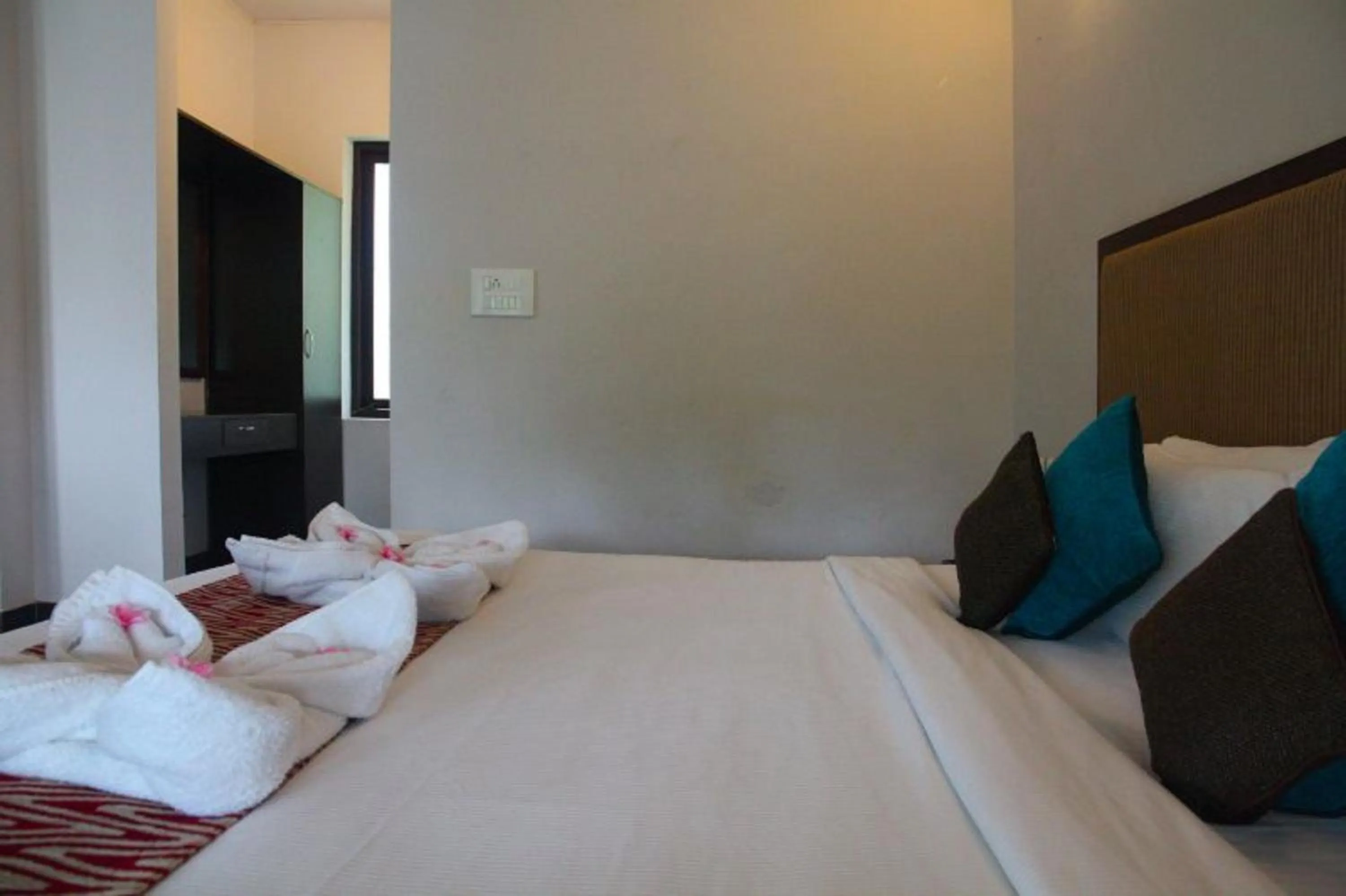 Bed in Kalathil Lake Resort