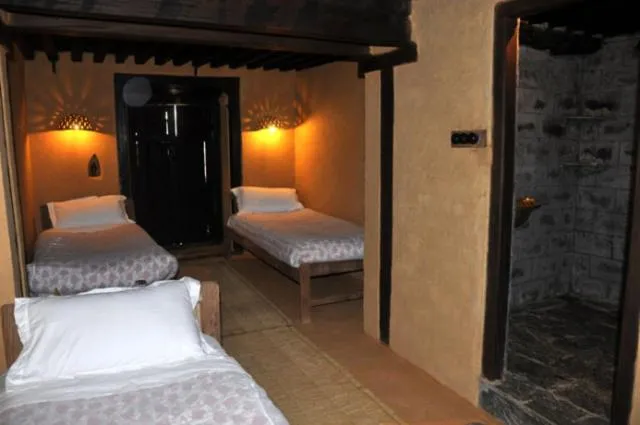 Photo of the whole room, Bed in Gaun Ghar Pvt Ltd