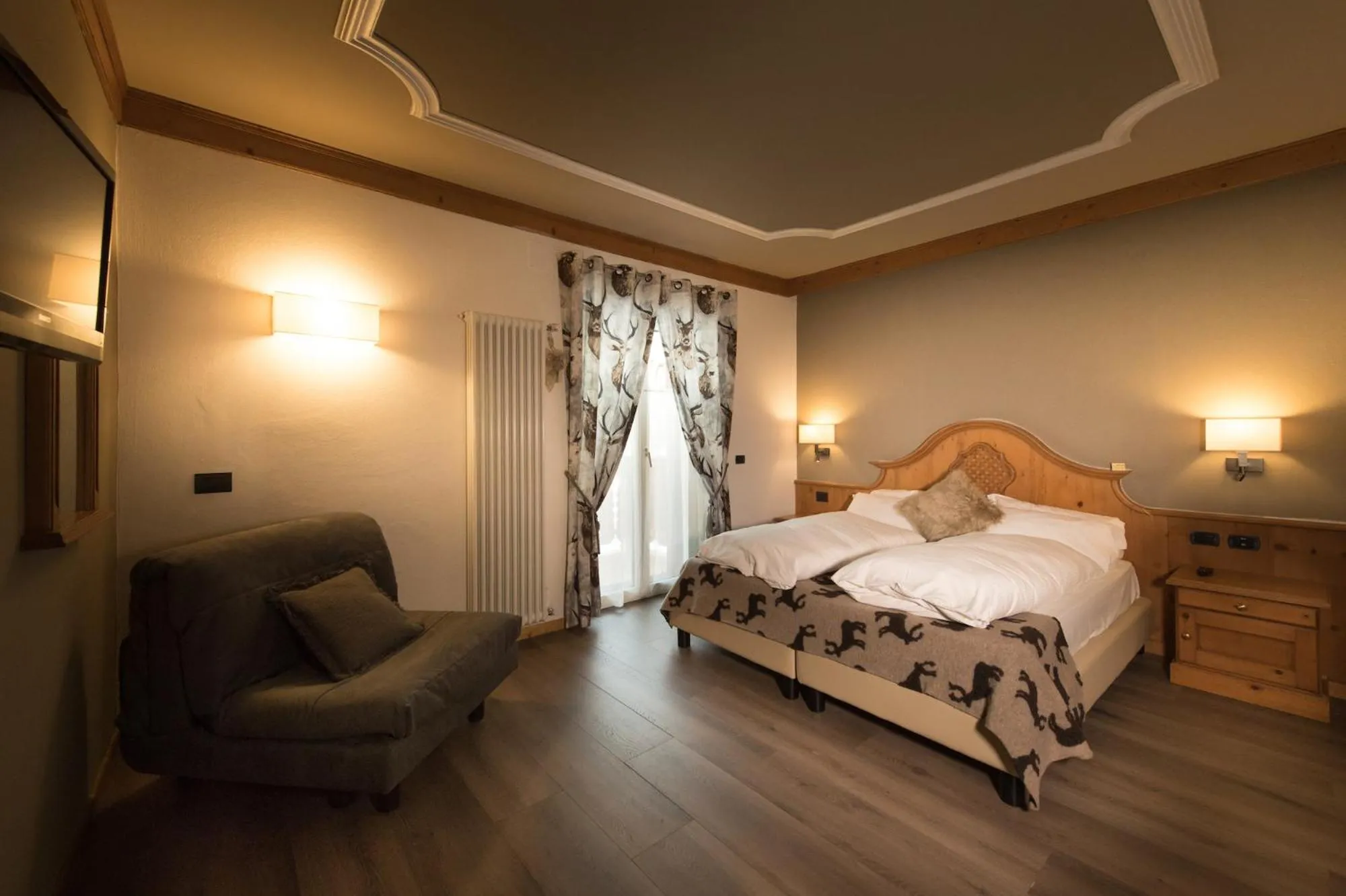 Photo of the whole room, Bed in Hotel Patrizia Dolomites Glamour