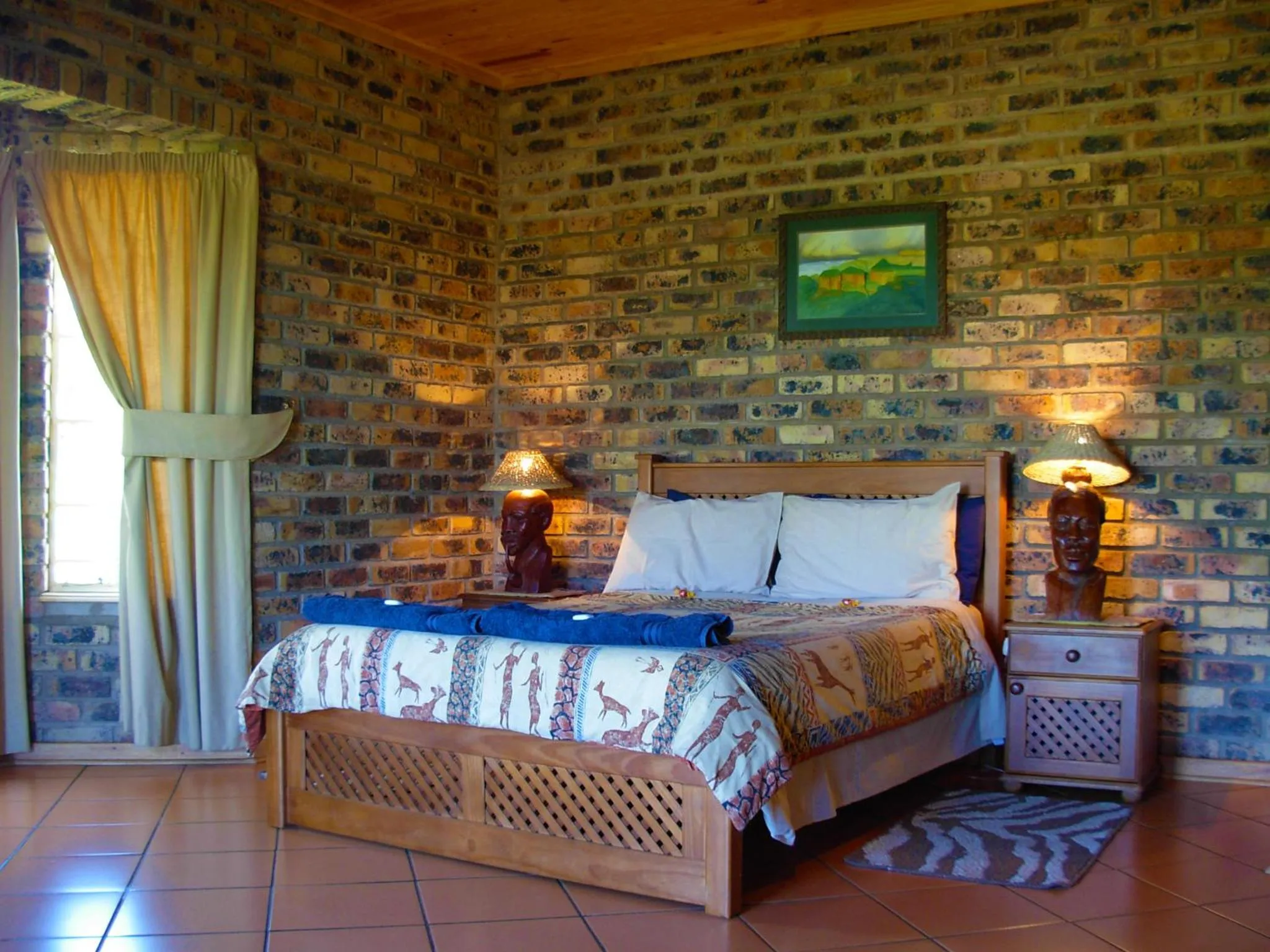 Bed in Thaba Tsweni Lodge & Safaris