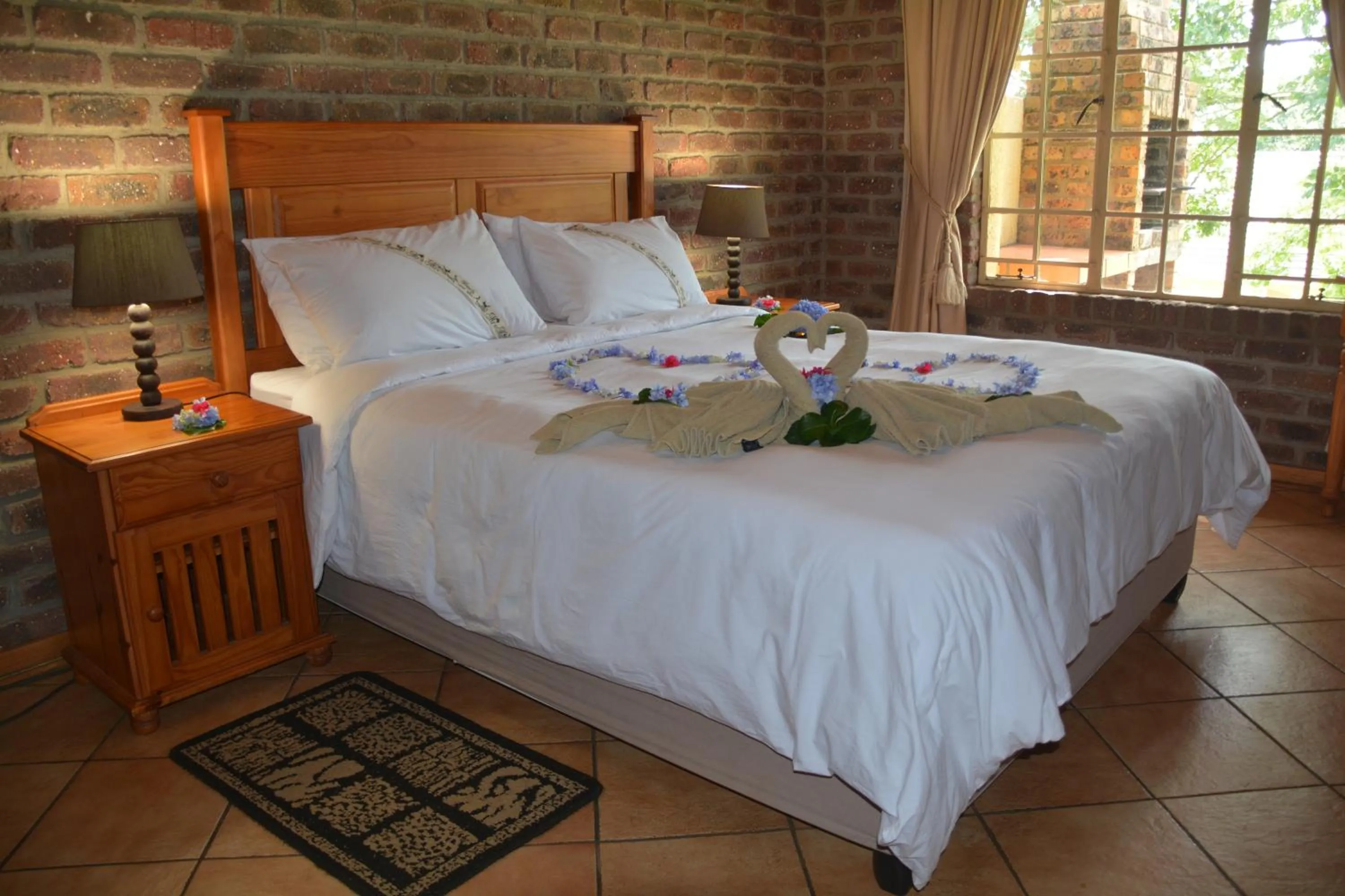 Decorative detail, Bed in Thaba Tsweni Lodge & Safaris