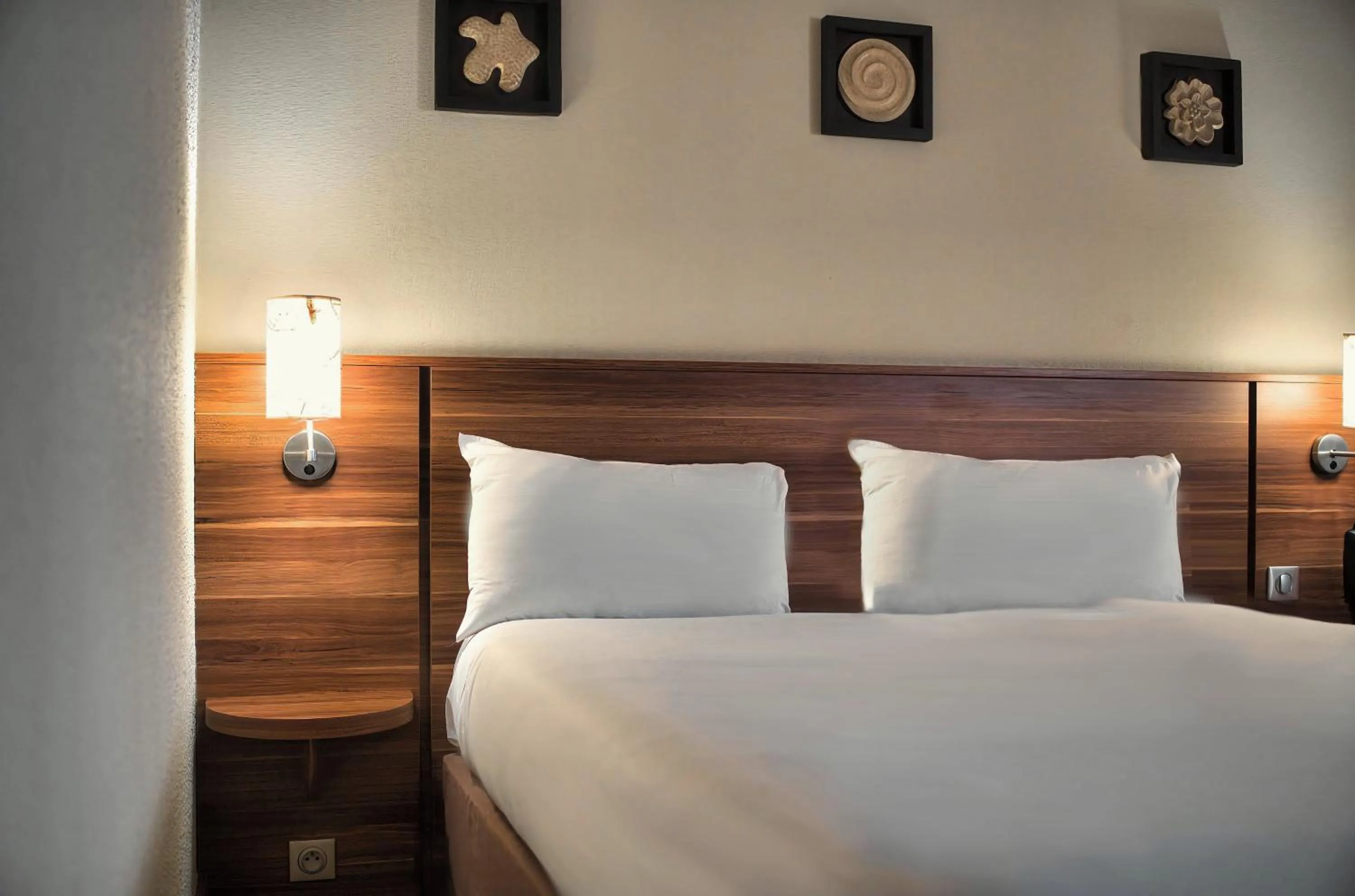 Bed in Kyriad Prestige Mulhouse - Basel