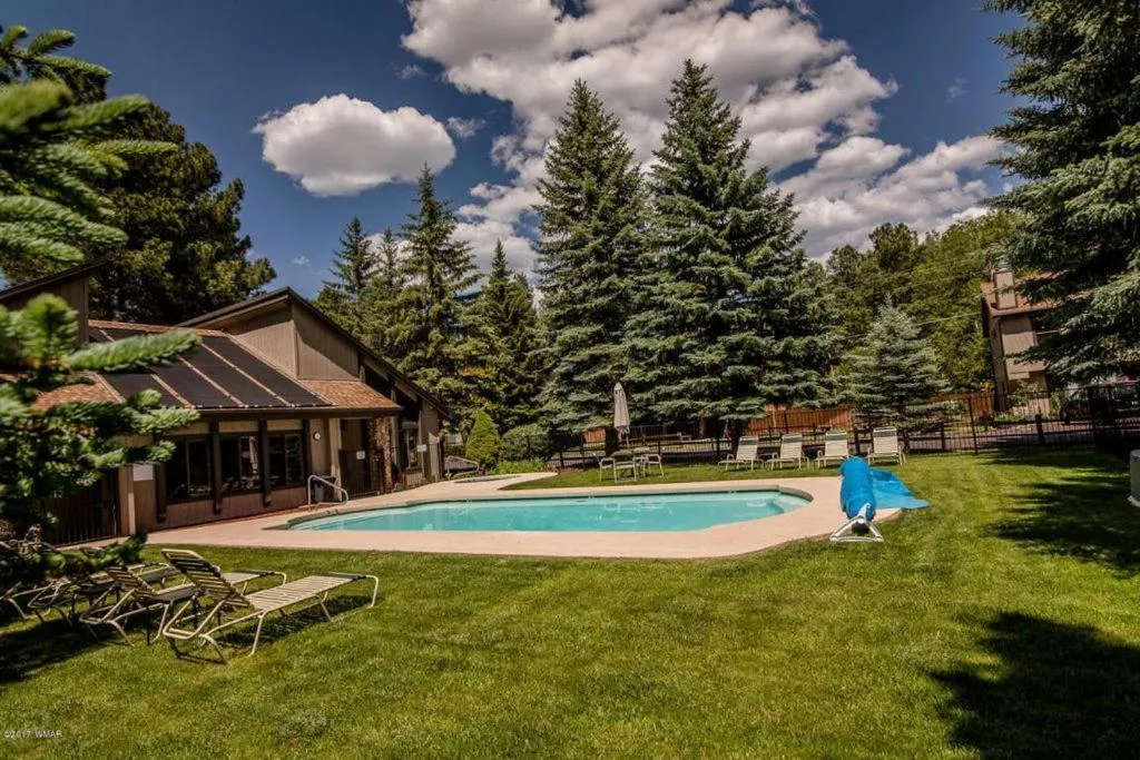 2BR Gated Escape With A Pool And Walk to Dining and Trails