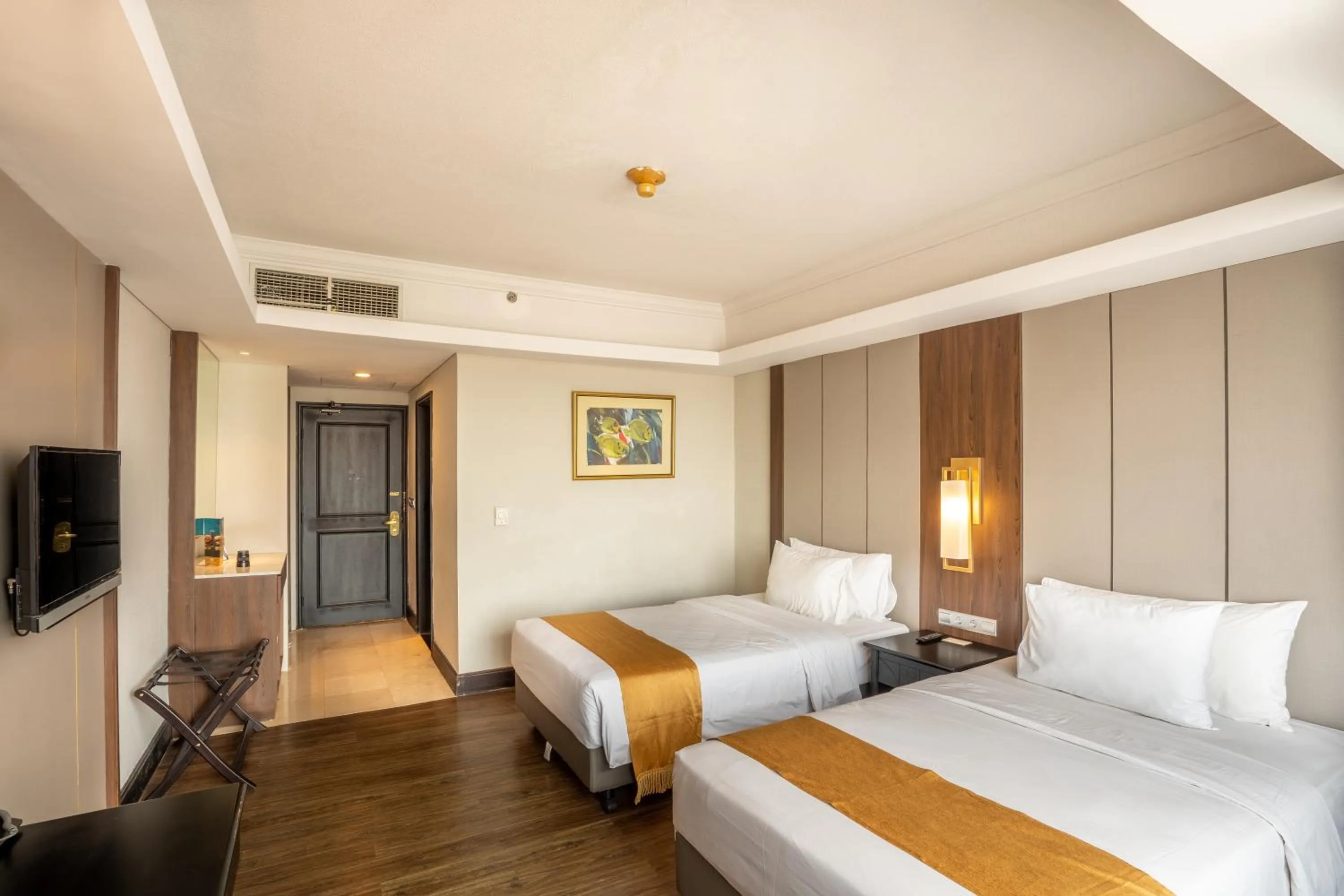 Bed in The Acacia Hotel Jakarta