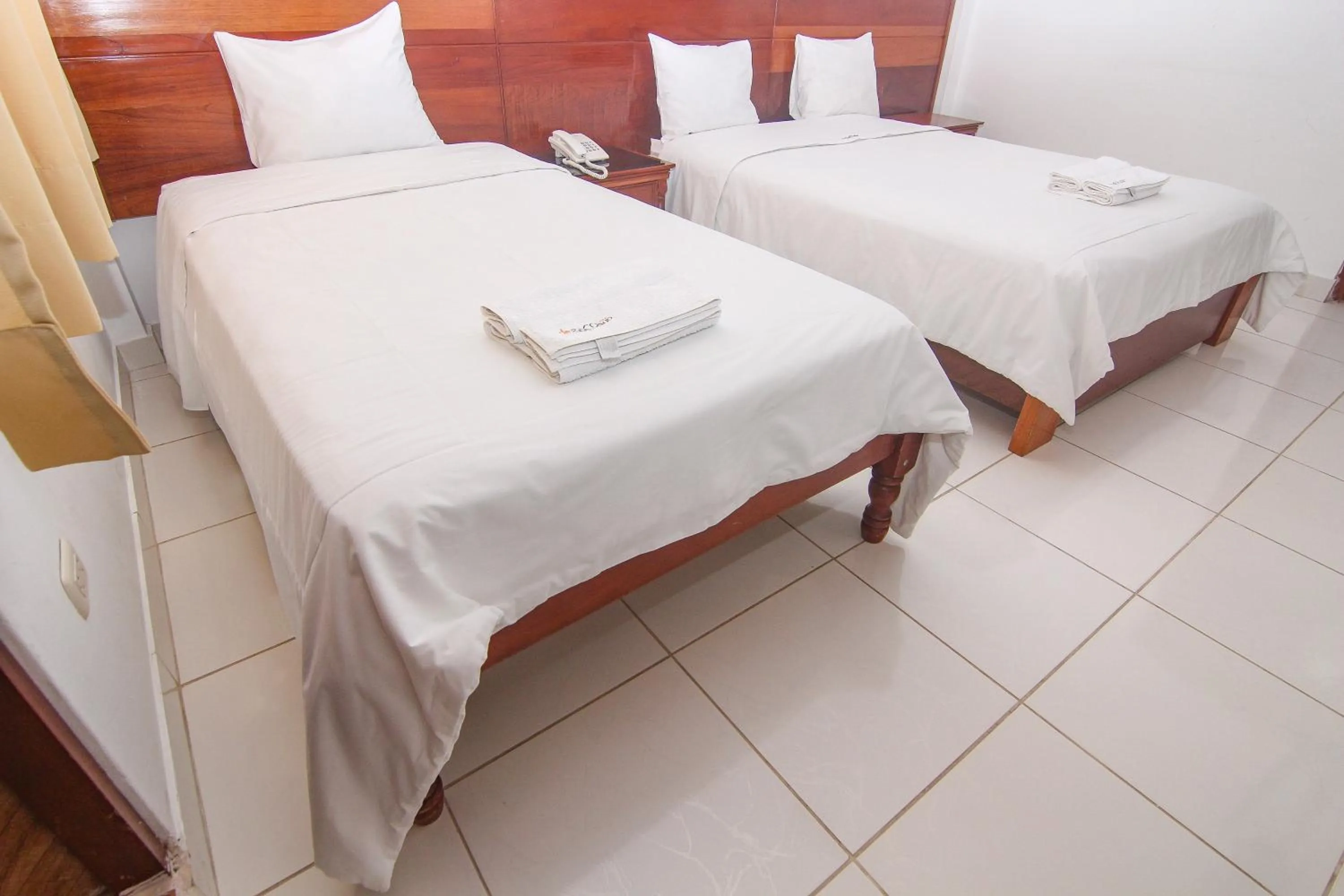 Bed in Hotel Rio Mayo