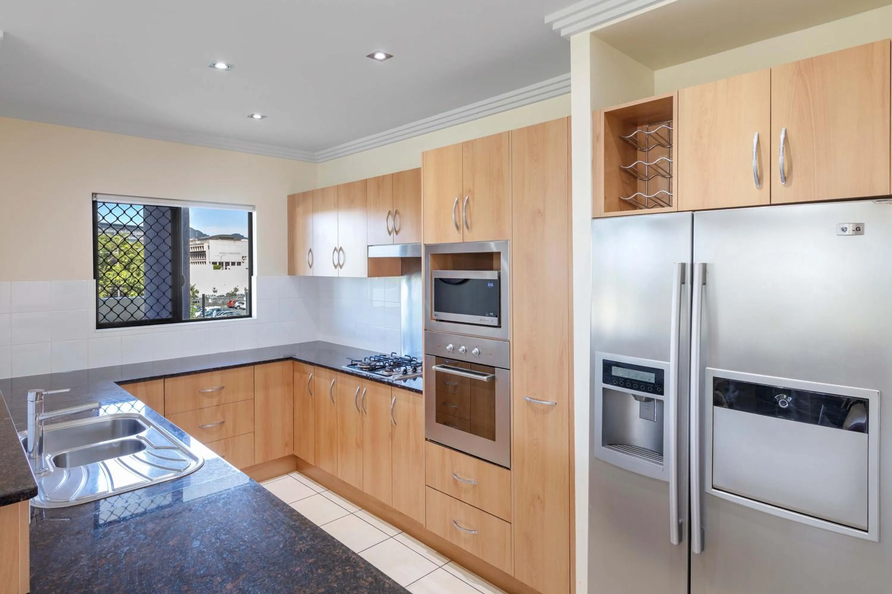 Kitchen or kitchenette in Piermonde Apartments Cairns
