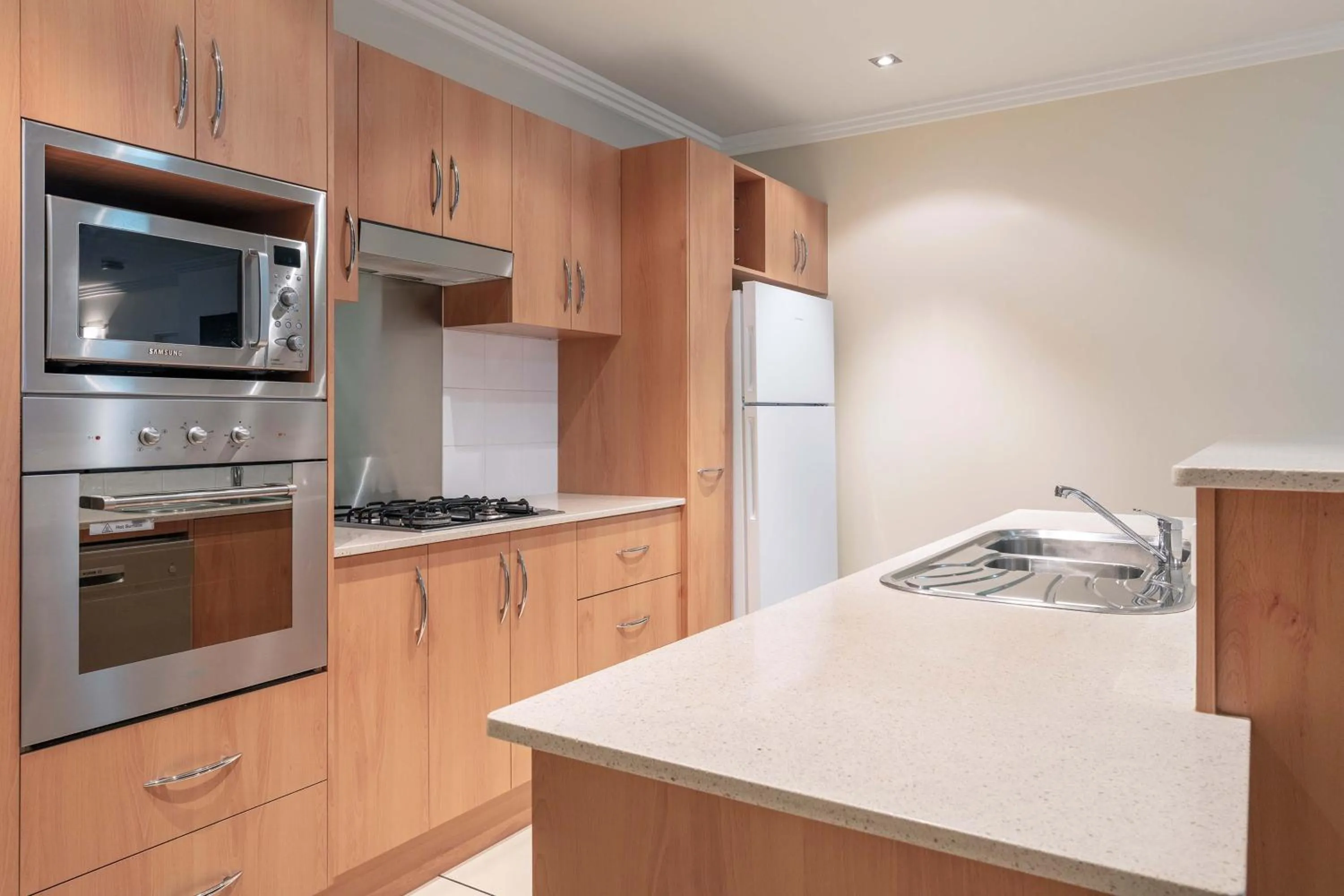 Kitchen or kitchenette in Piermonde Apartments Cairns