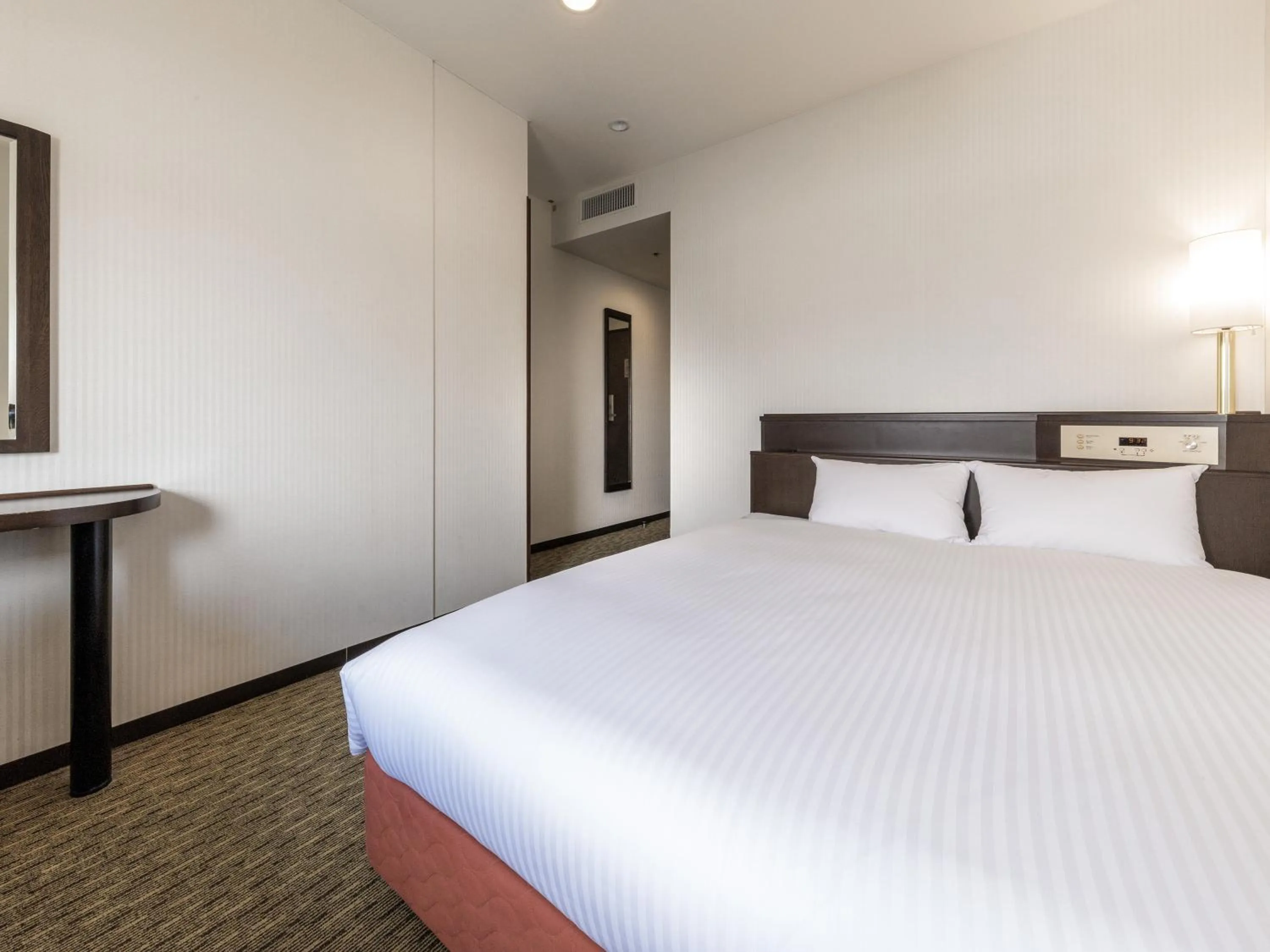 Photo of the whole room, Bed in Nishitetsu Inn Kurosaki