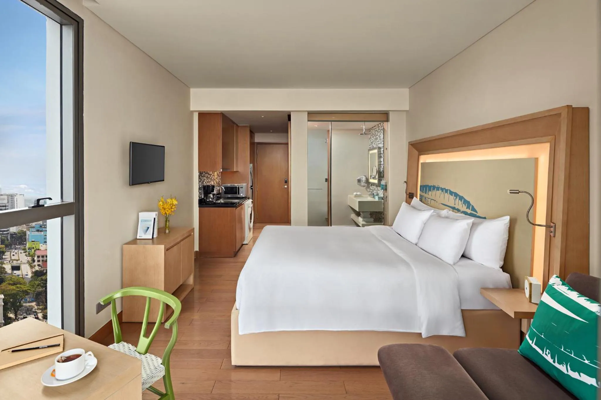 Kitchen or kitchenette, Bed in Novotel Danang Premier Han River