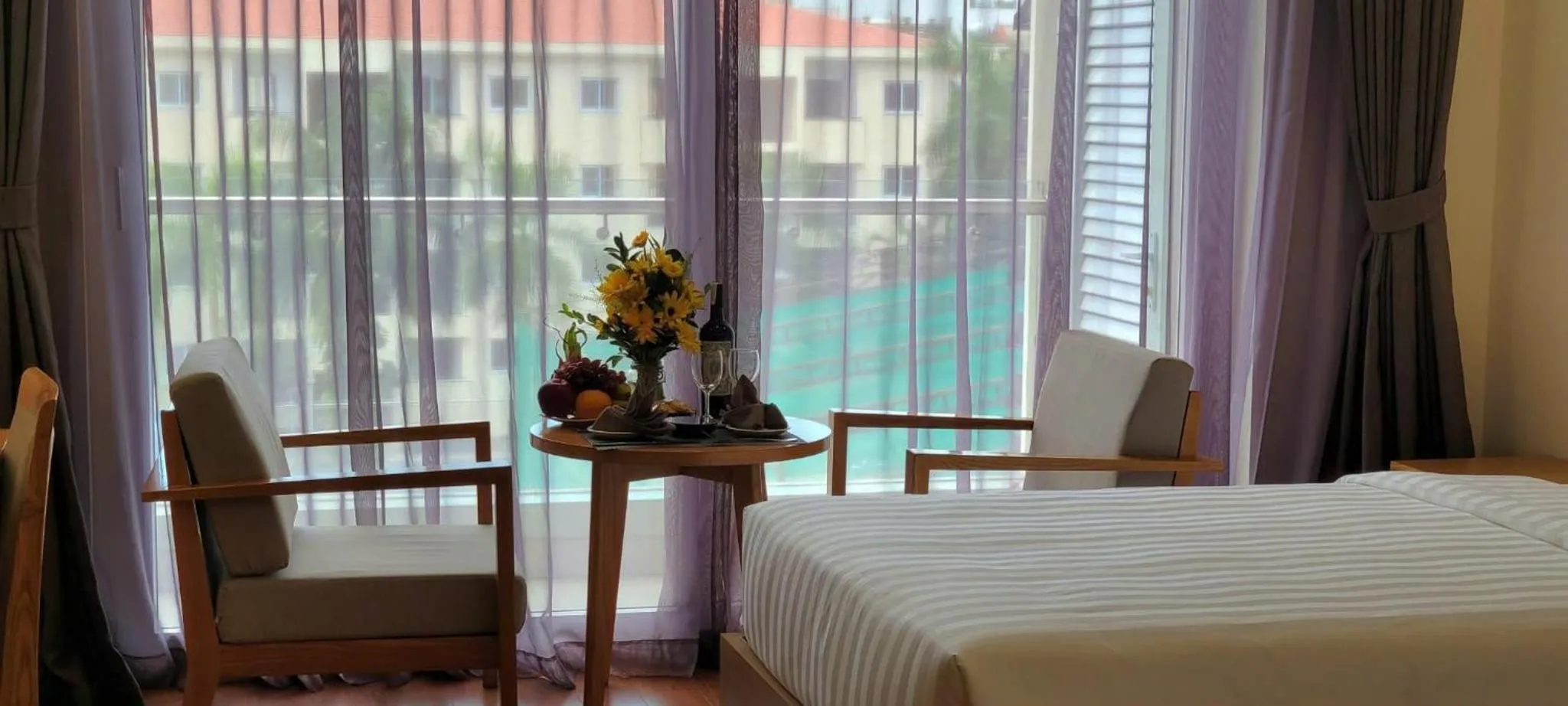 Bed in Sunflower Hotel & International Village