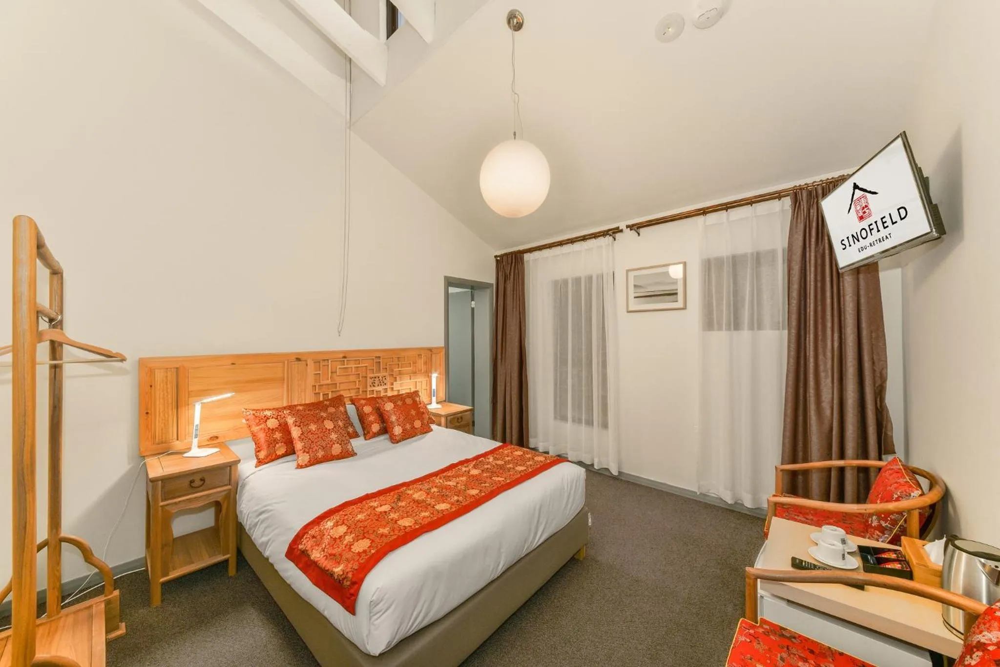 Bed in Sinofield Edu-Retreat