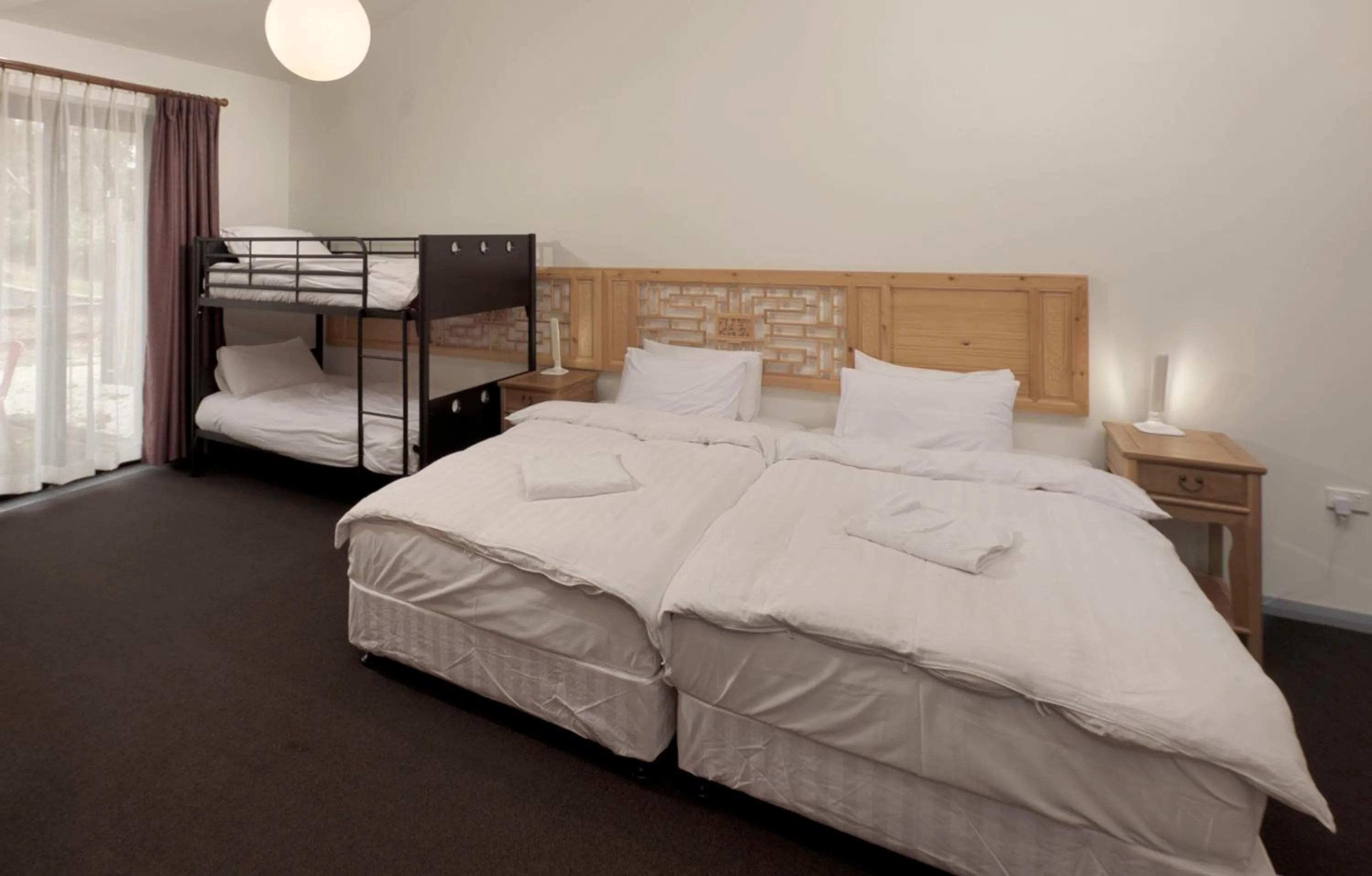 Bed in Sinofield Edu-Retreat