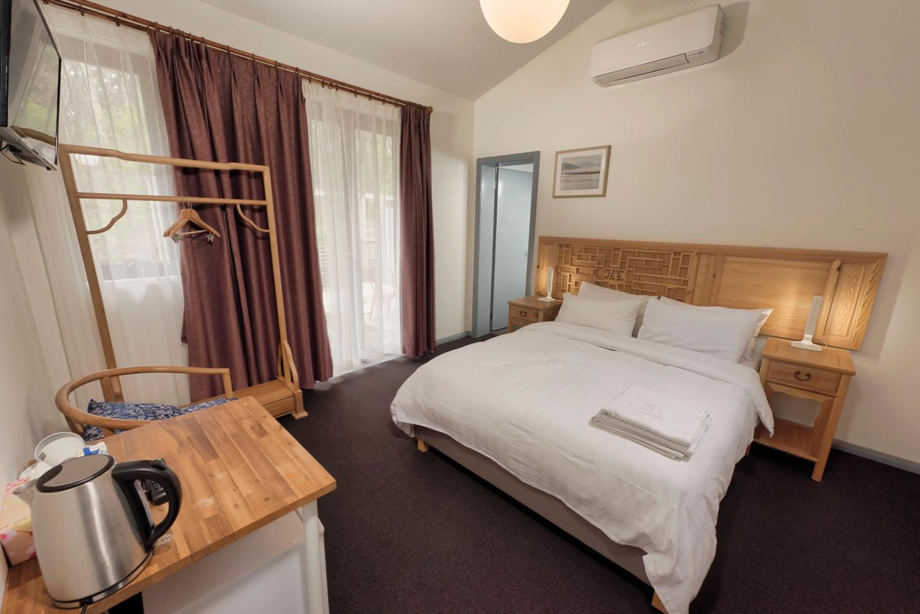 Bed in Sinofield Edu-Retreat