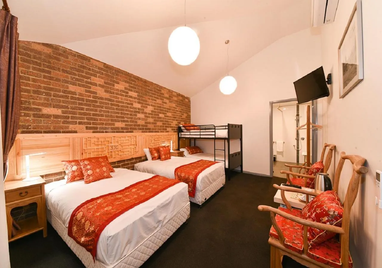 Bed in Sinofield Edu-Retreat