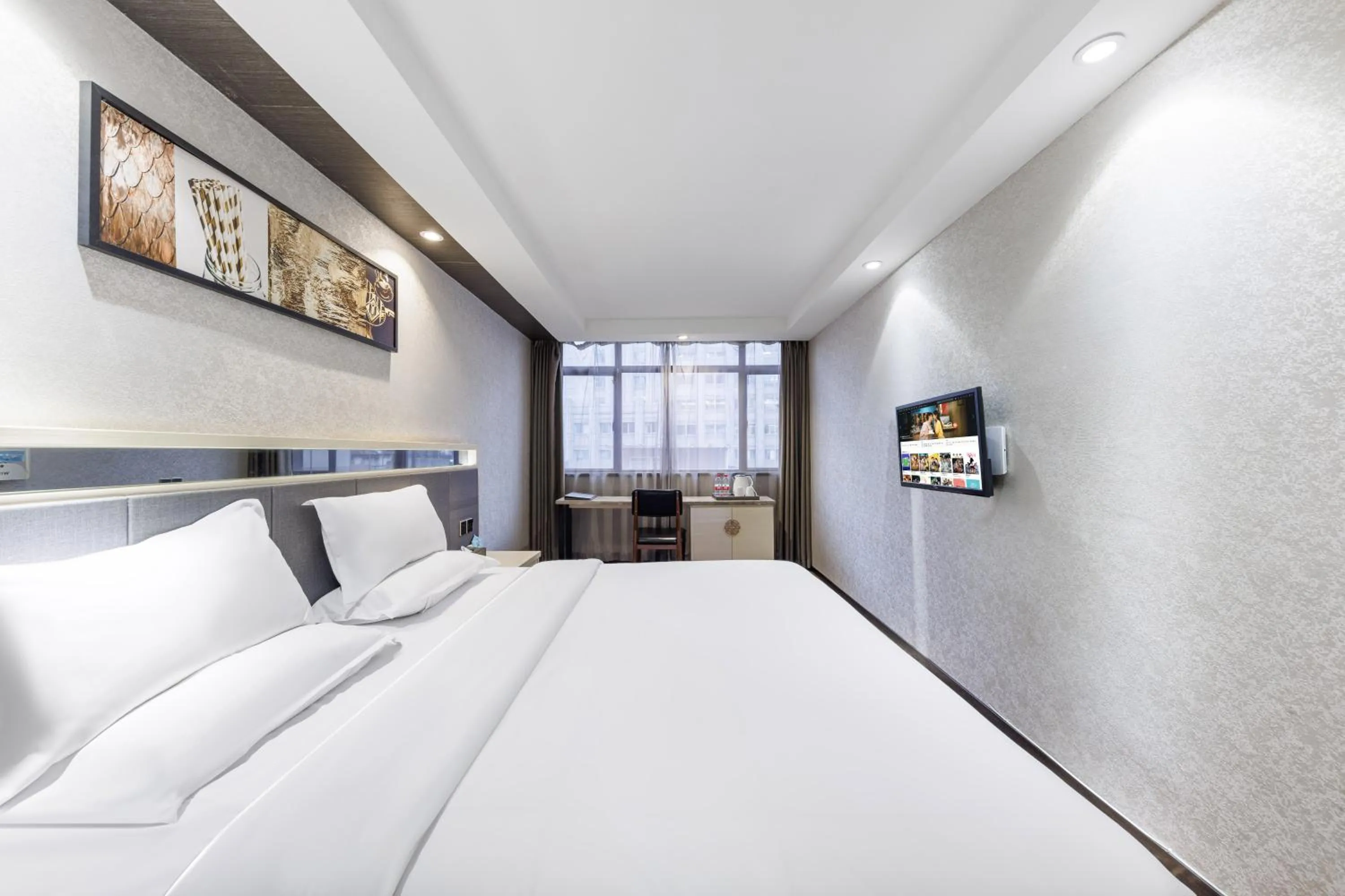 Bed in Fuhao Hotel