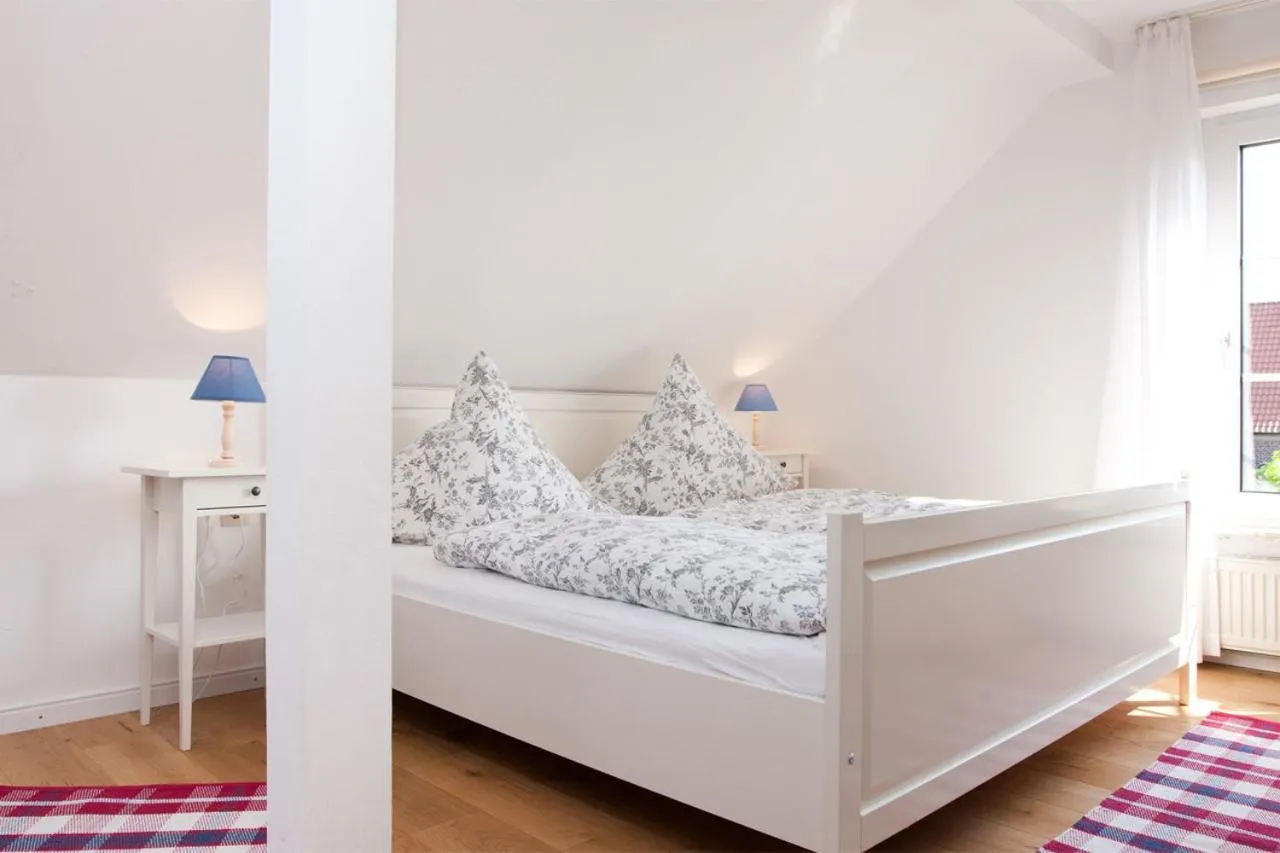 Bed in Landhaus Lillesand