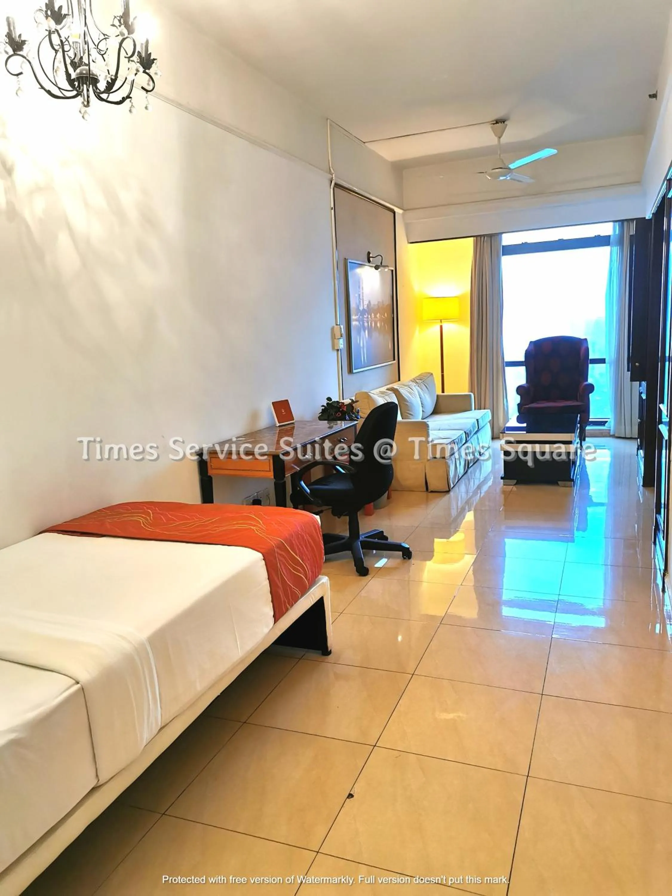 Living room, Bed in Times Service Suites @ Times Square