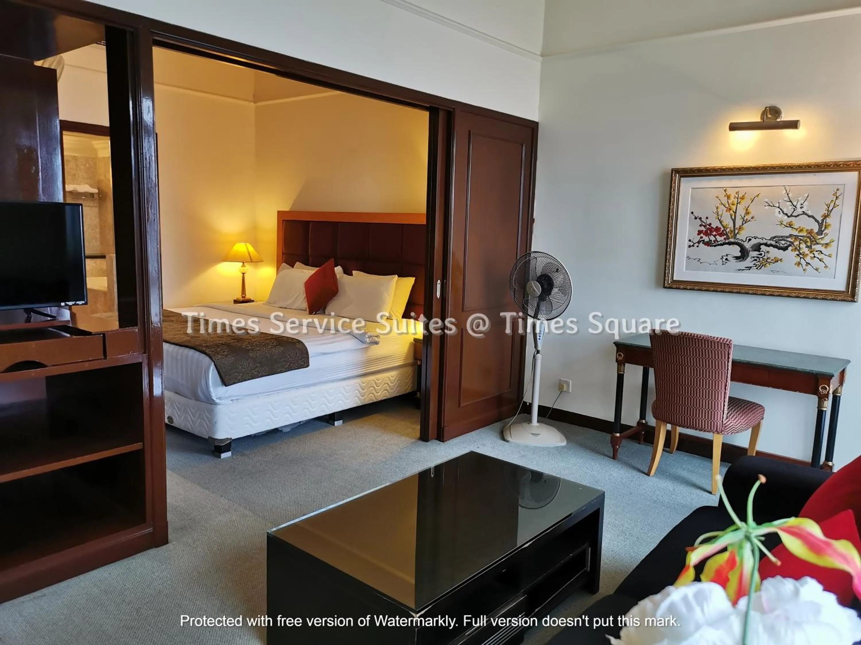 Living room, Bed in Times Service Suites @ Times Square